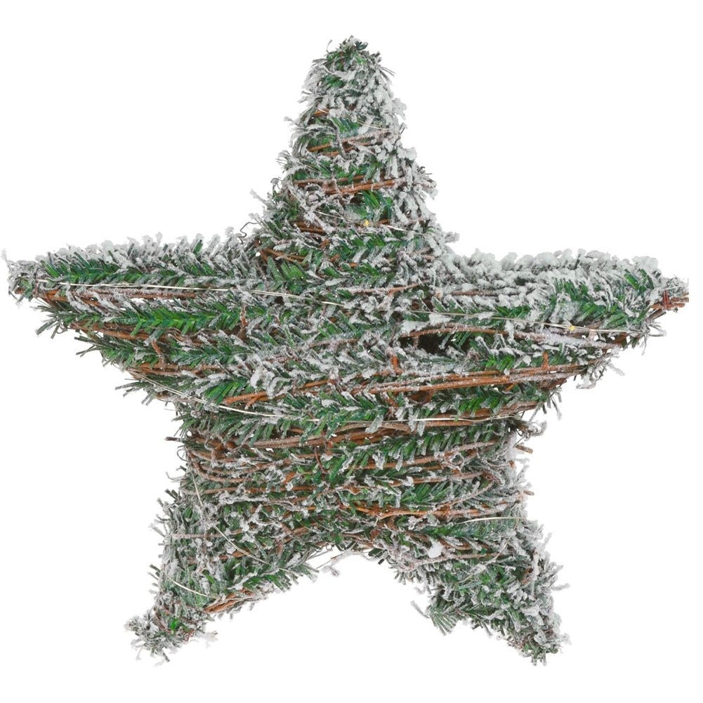 Una estrella de ramas cubierta de nieve artificial.