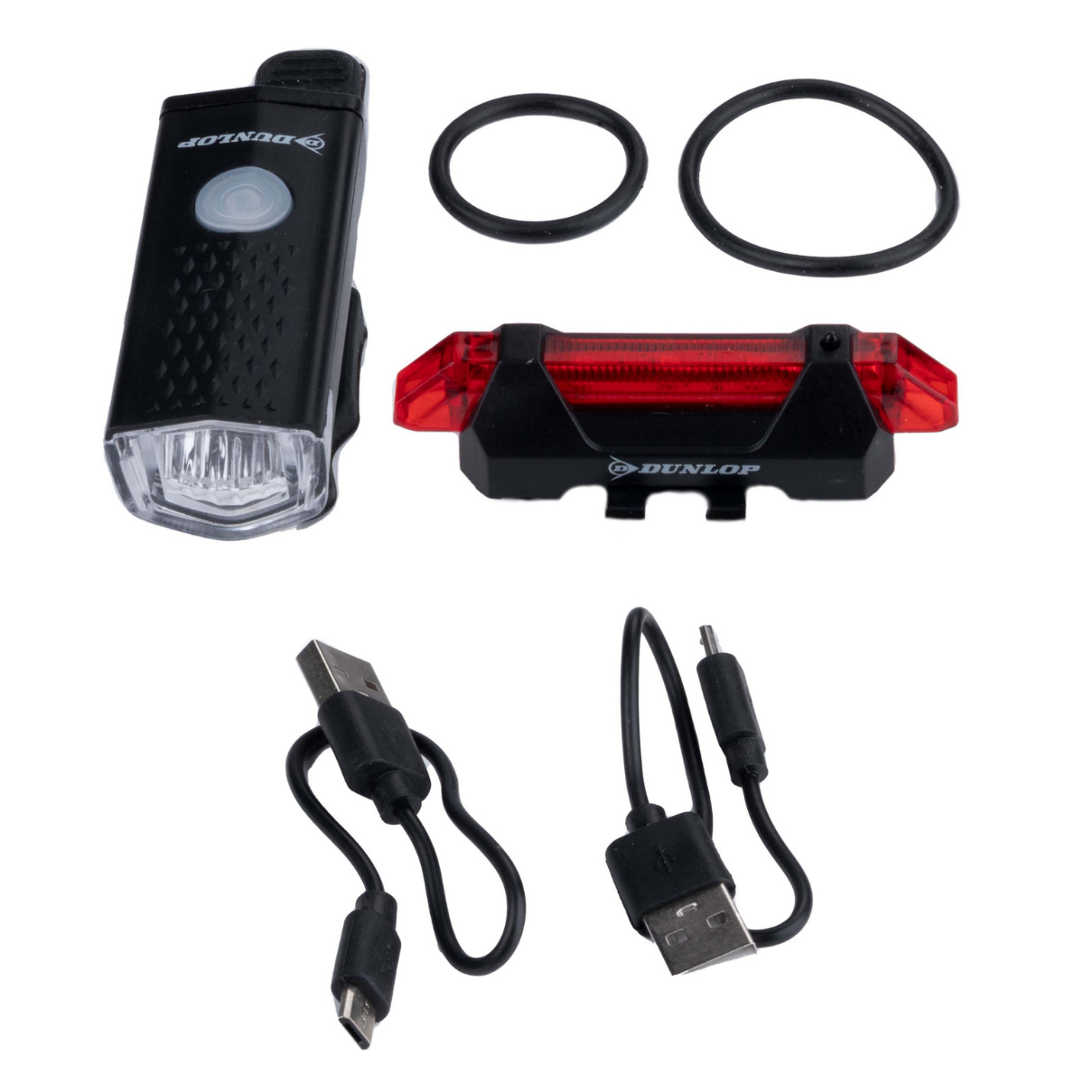 Een zwarte fietslamp, een rood achterlicht, twee rubberen ringen en twee USB-kabels.