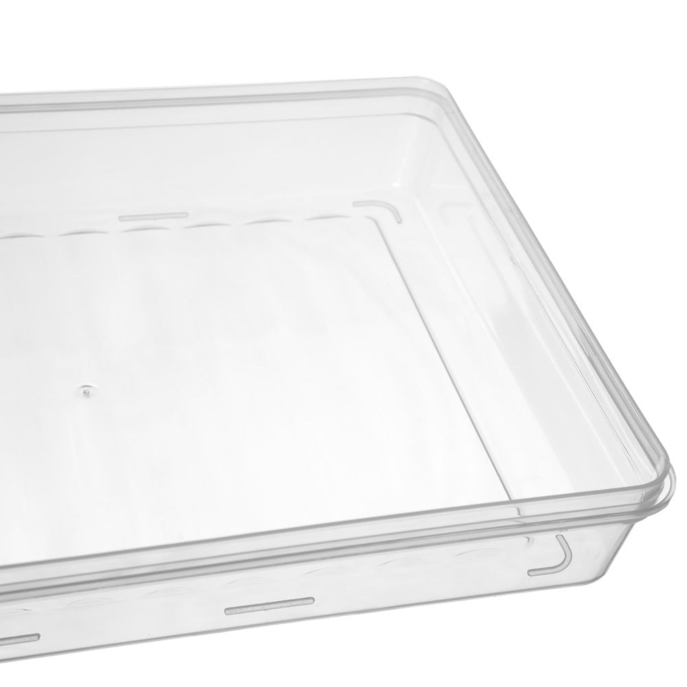 Una caja de plástico rectangular transparente con esquinas redondeadas y tapa.
