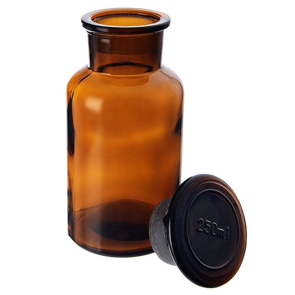 Botella de vidrio ámbar con tapón negro, 250 ml.