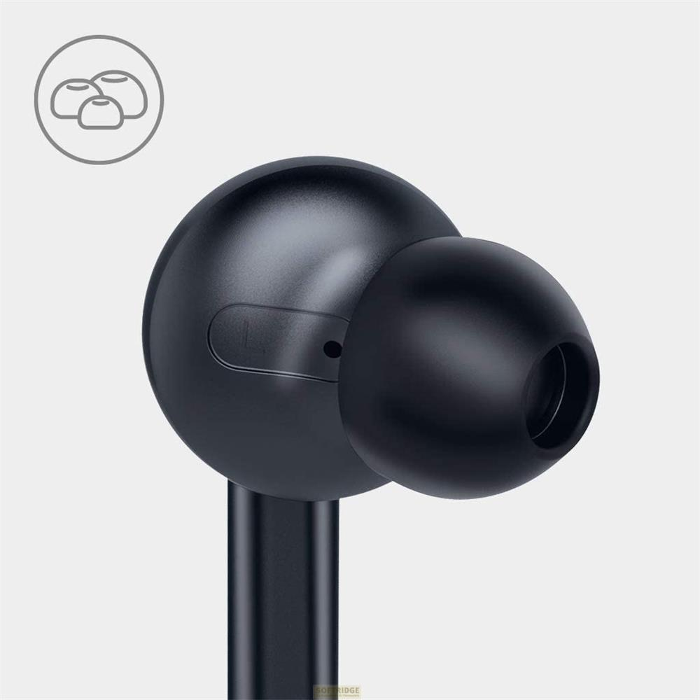 Gros plan d'un écouteur noir avec un cercle montrant trois embouts d'oreille.