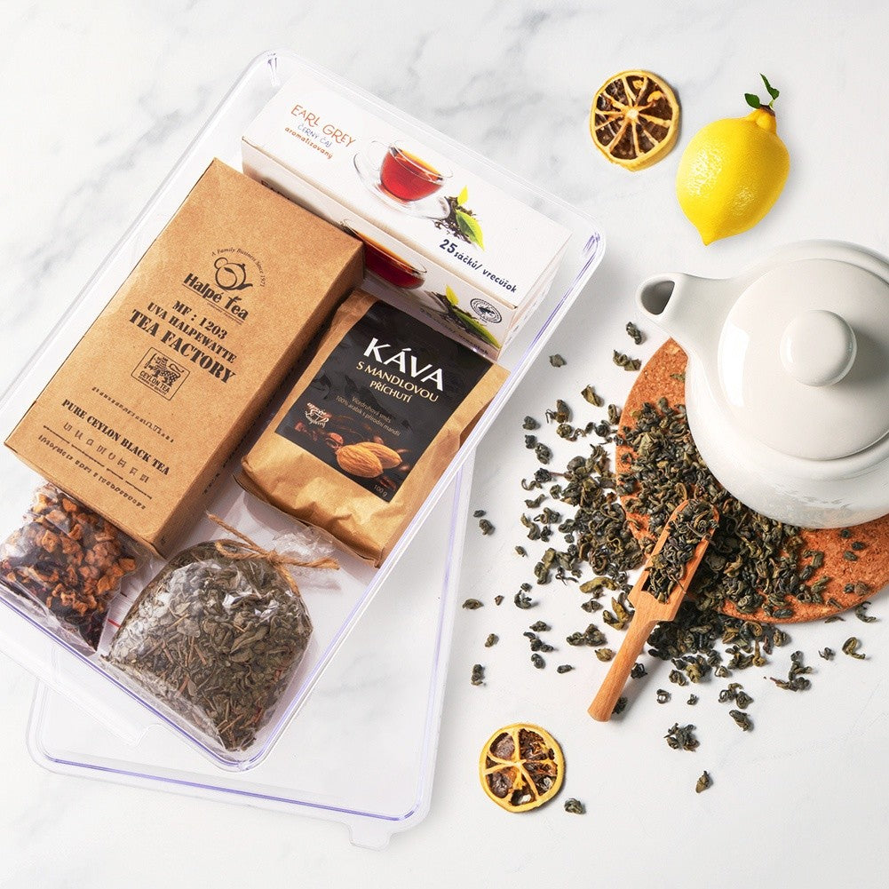 Surtido de té en caja con Earl Grey, té negro, café y limón.