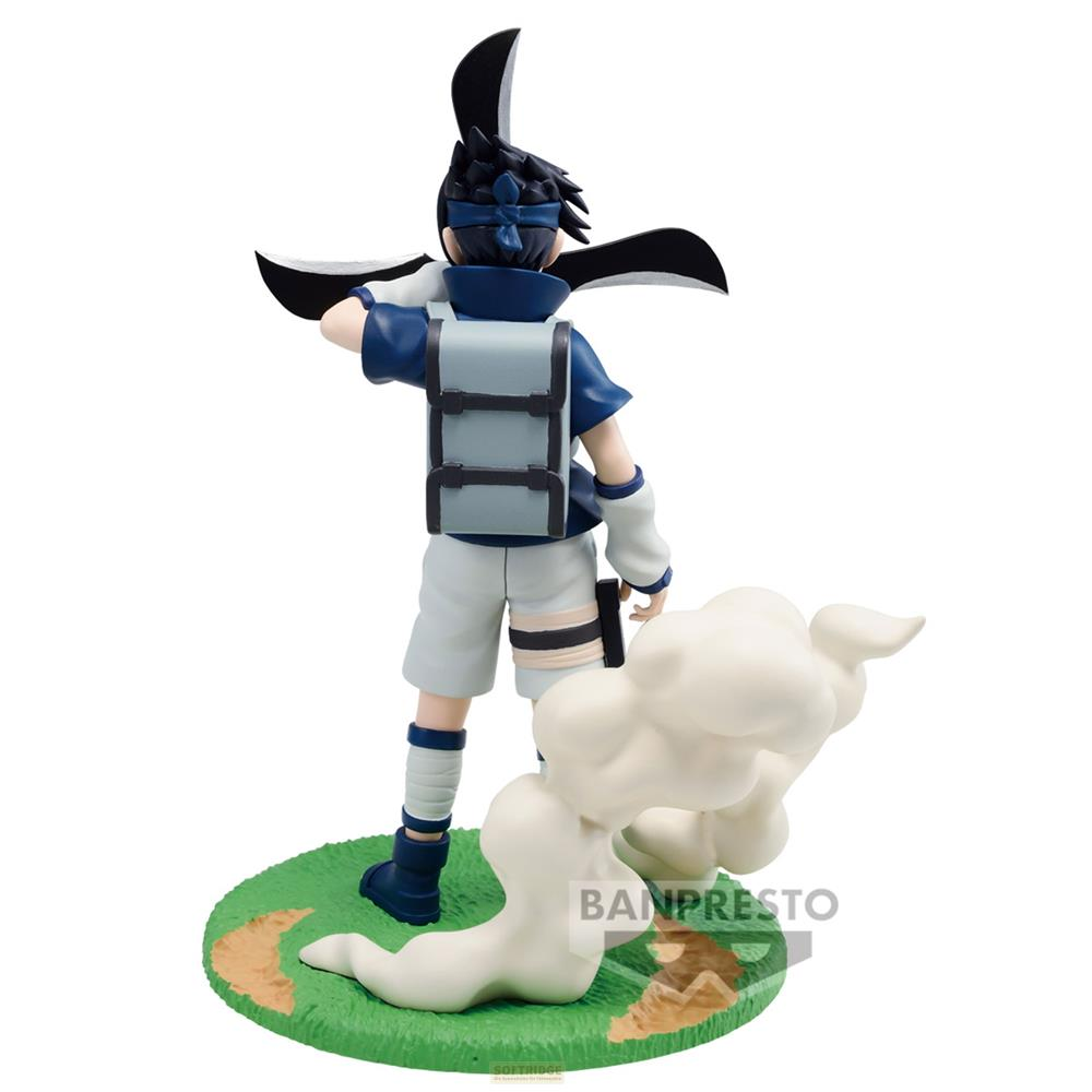 Una figura de anime con ropa azul y blanca está sobre una base verde con humo.