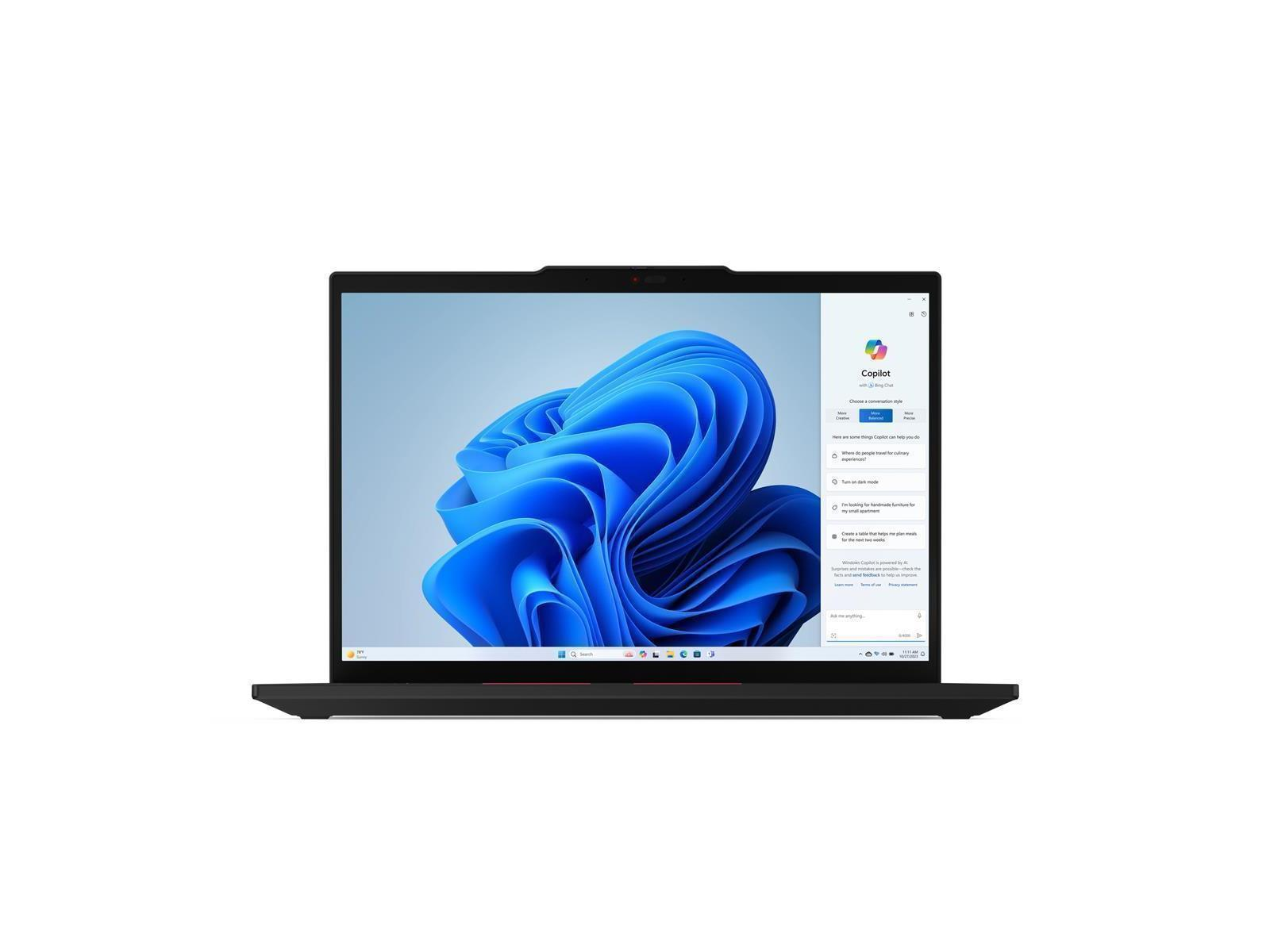 Ein schwarzer Laptop zeigt ein blaues Wellenmuster auf dem Bildschirm.