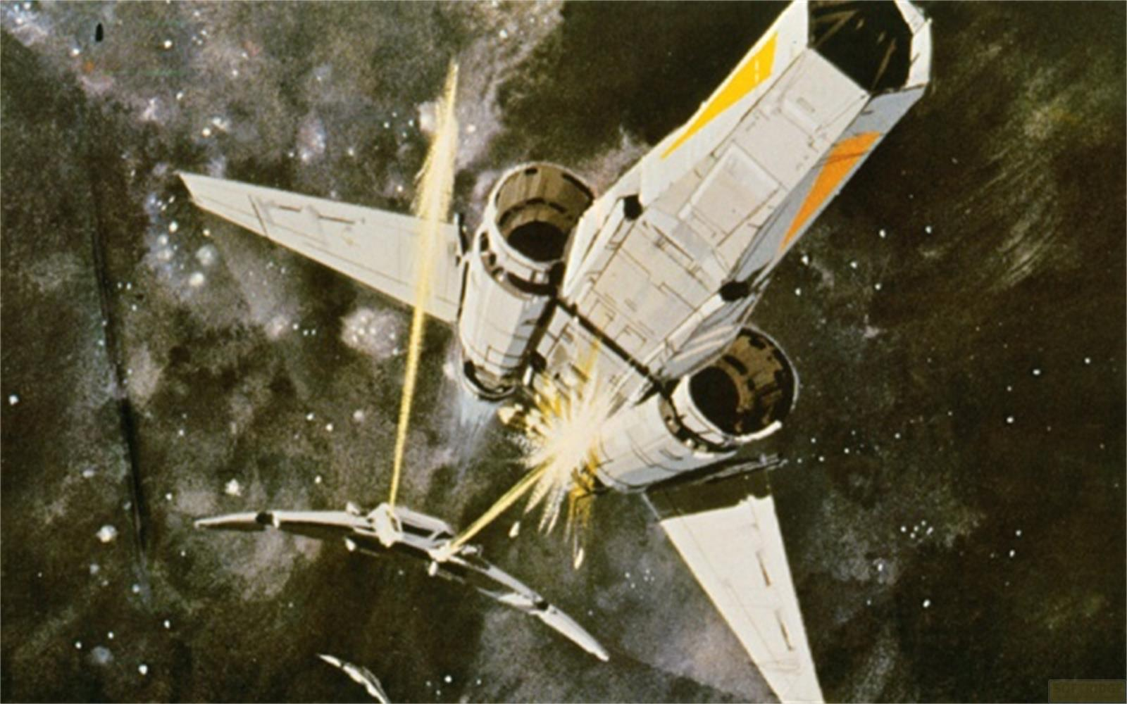 Due astronavi combattono nello spazio, una viene colpita.