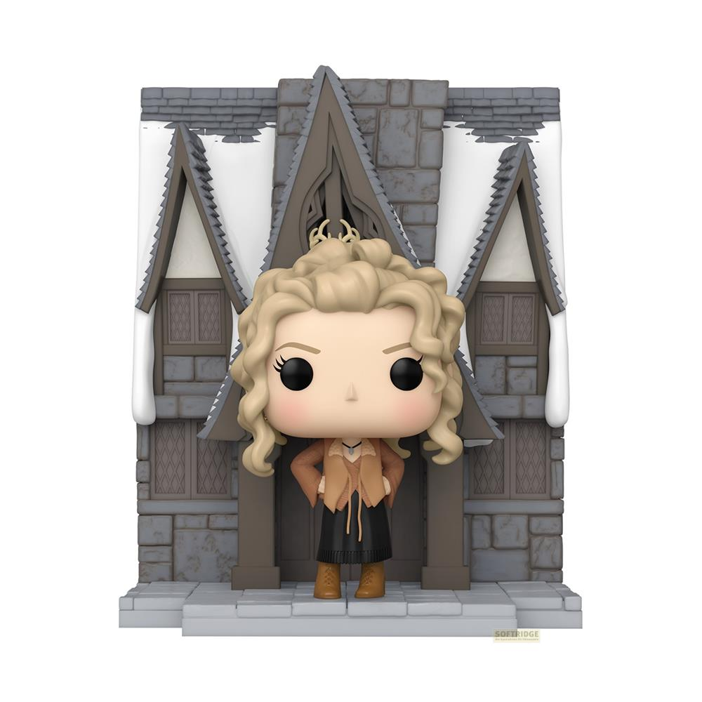 Una figura Funko di una donna con ricci biondi davanti a una casa innevata.