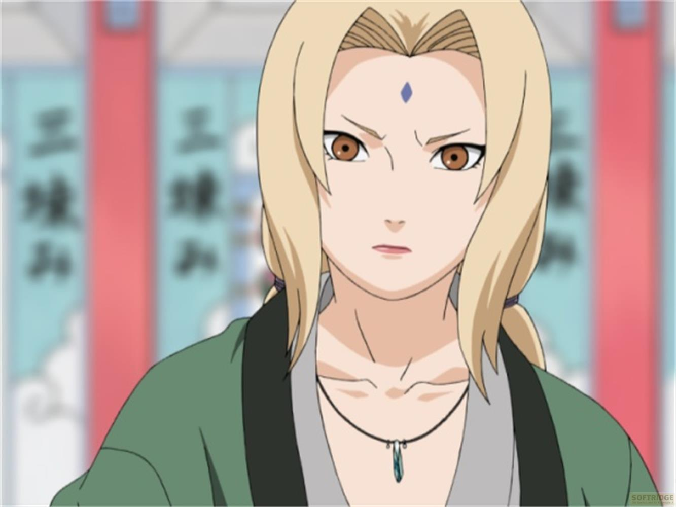 Une femme anime d'apparence sérieuse aux cheveux blonds et aux yeux bruns, vêtue d'une tenue verte et grise, sur un fond flou.