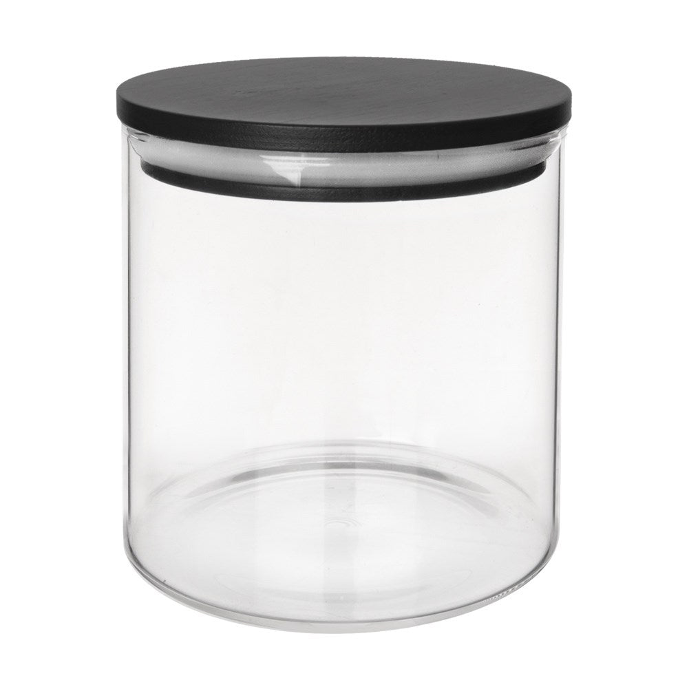 Un frasco de vidrio transparente con tapa negra, aislado sobre fondo blanco.