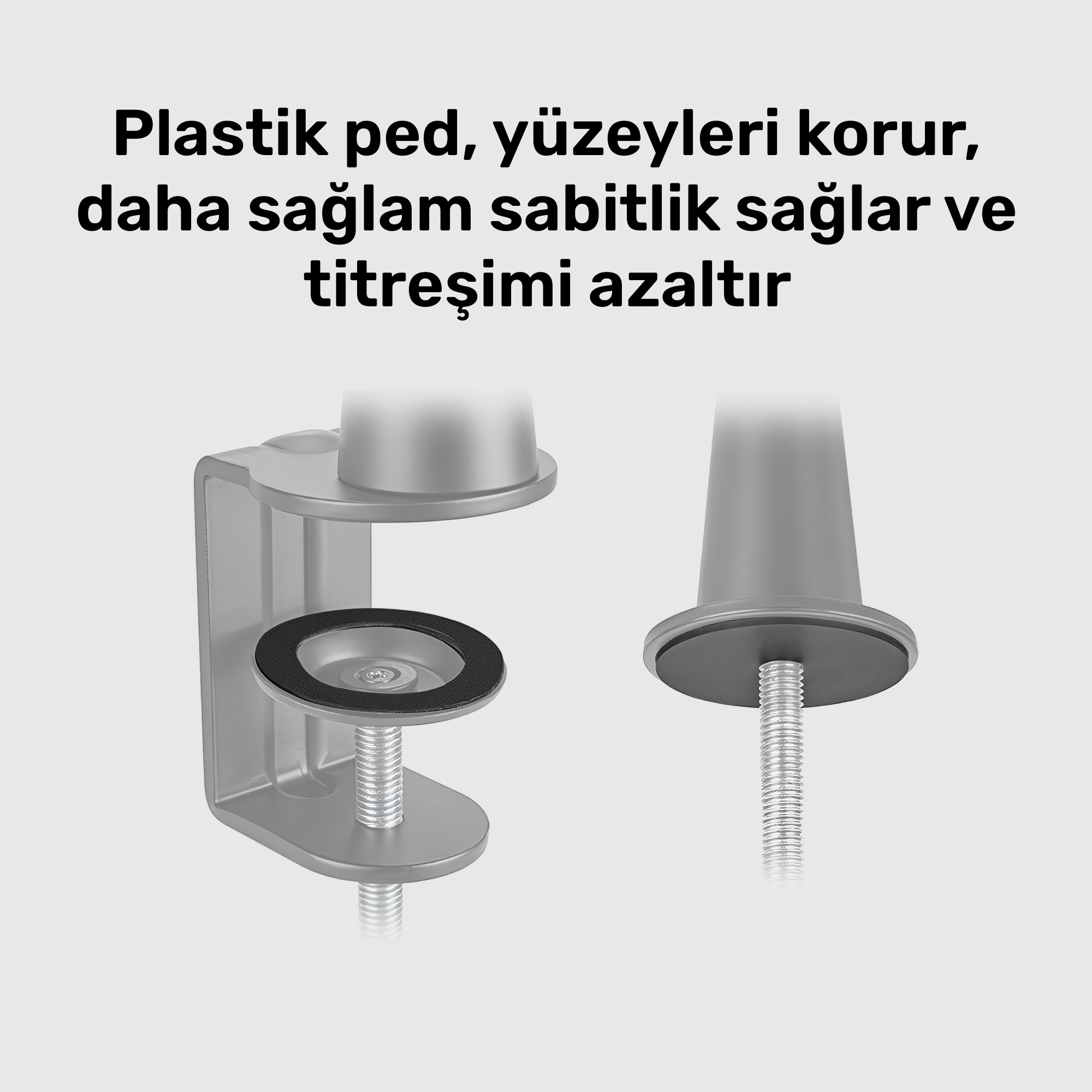 Siyah lastik pedli gri kelepçe ve vidalı cıvata.