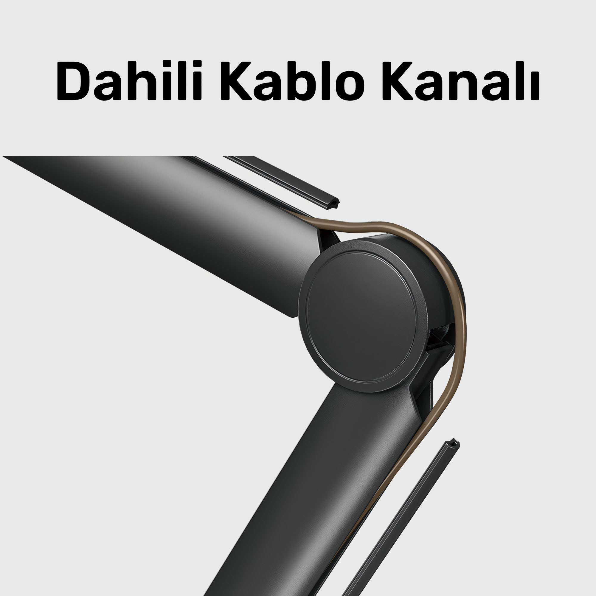 Entegre kablo kanallı siyah kol ve kahverengi kablo yakın çekimi.