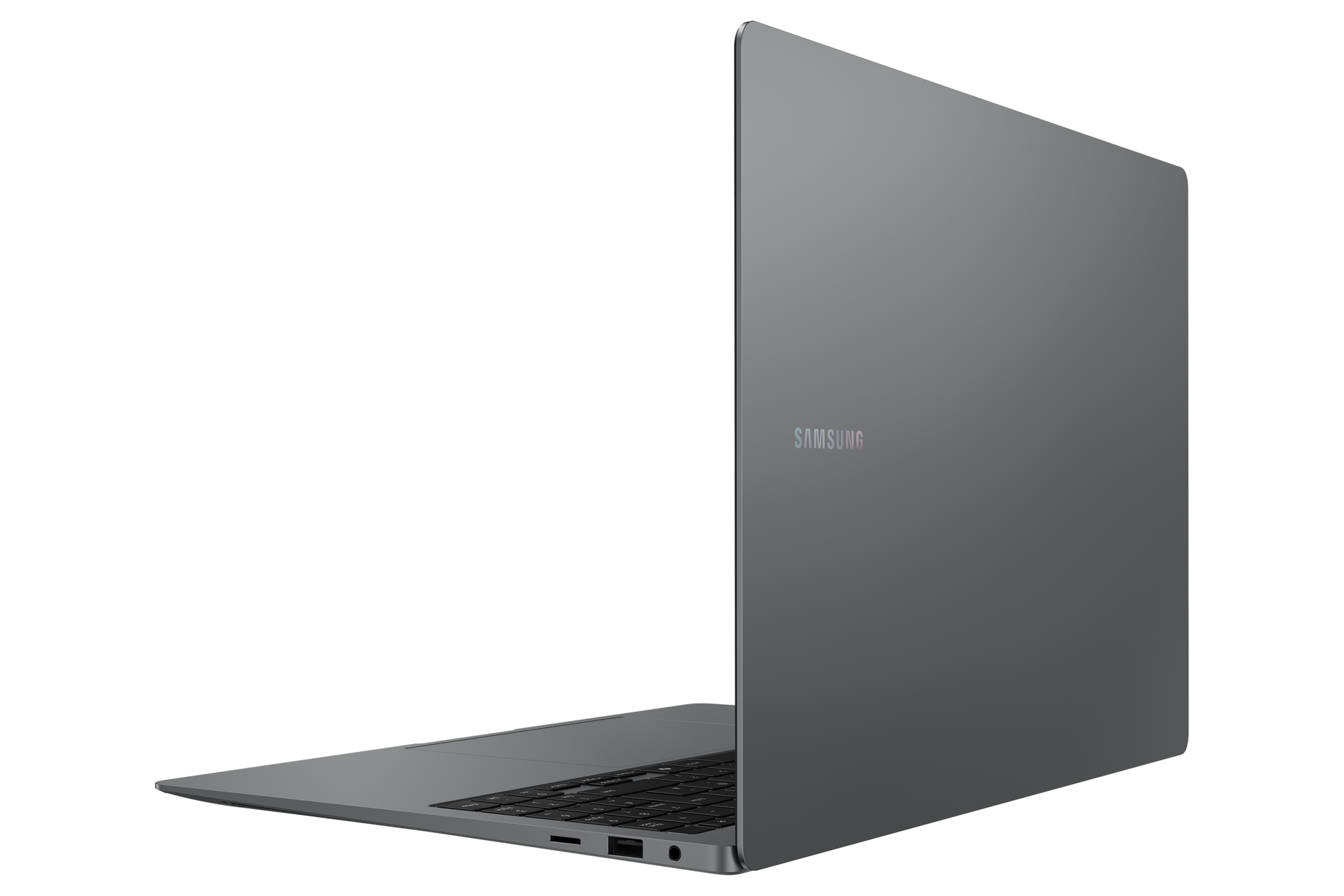 Ein geschlossener, grauer Samsung Laptop auf schwarzem Hintergrund, von der Seite gesehen.