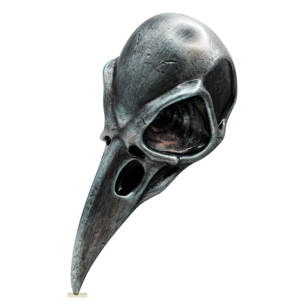 Graue Vogelkopfskelett-Maske mit offenem Schnabel und Augenhöhlen.