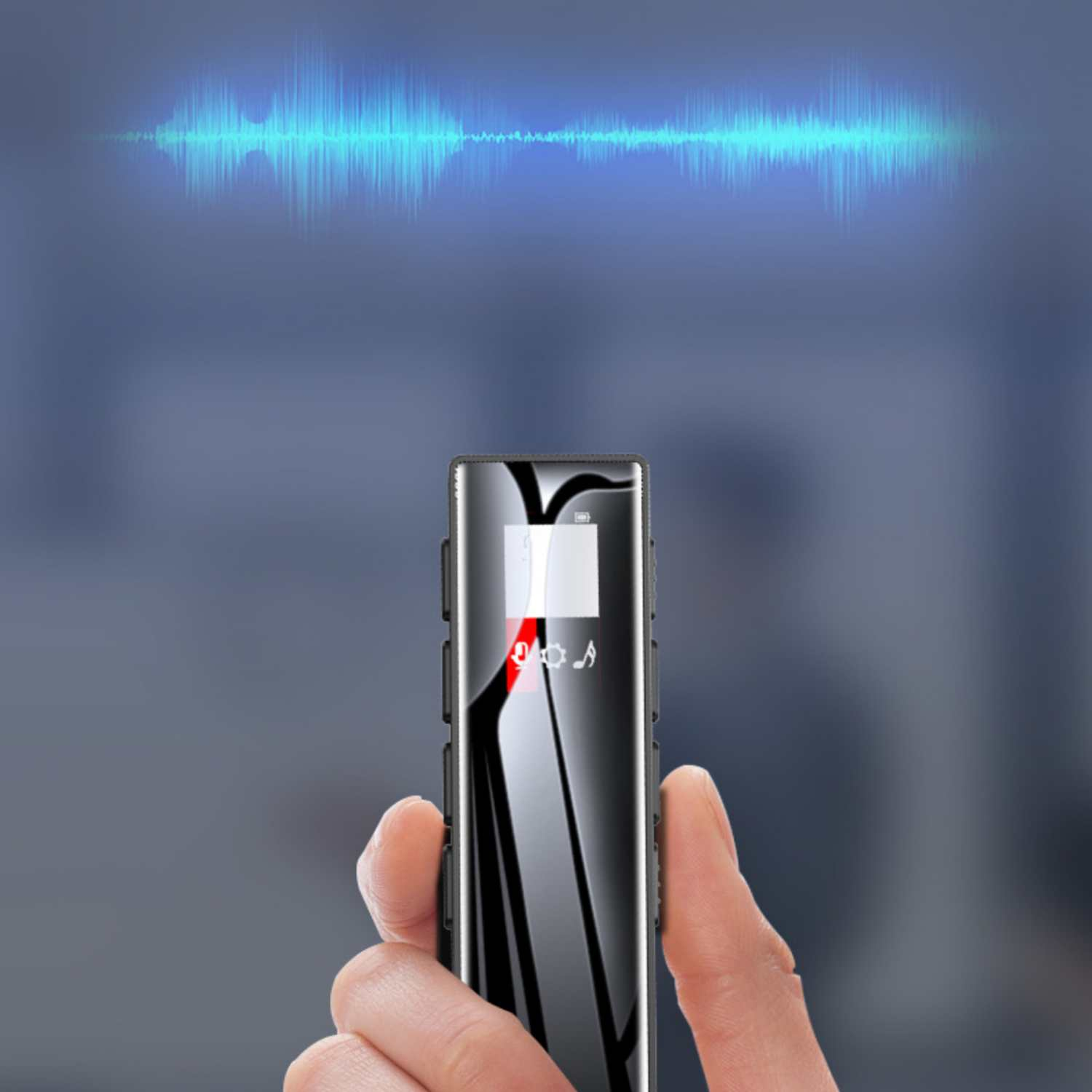 Ein Finger hält einen digitalen Recorder mit einem Wellenform-Display.