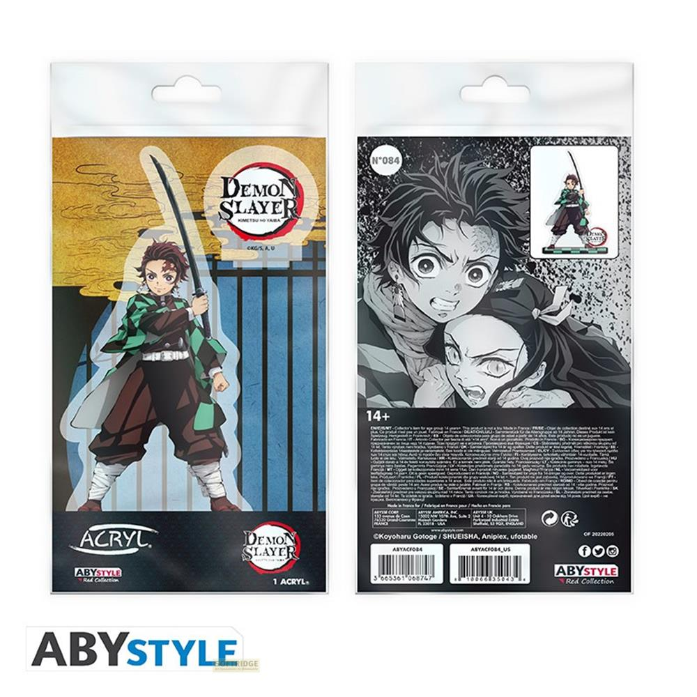 Anime-Akrylfigur von Tanjiro mit Schwert, neben einer Packung mit Charakterbildern.