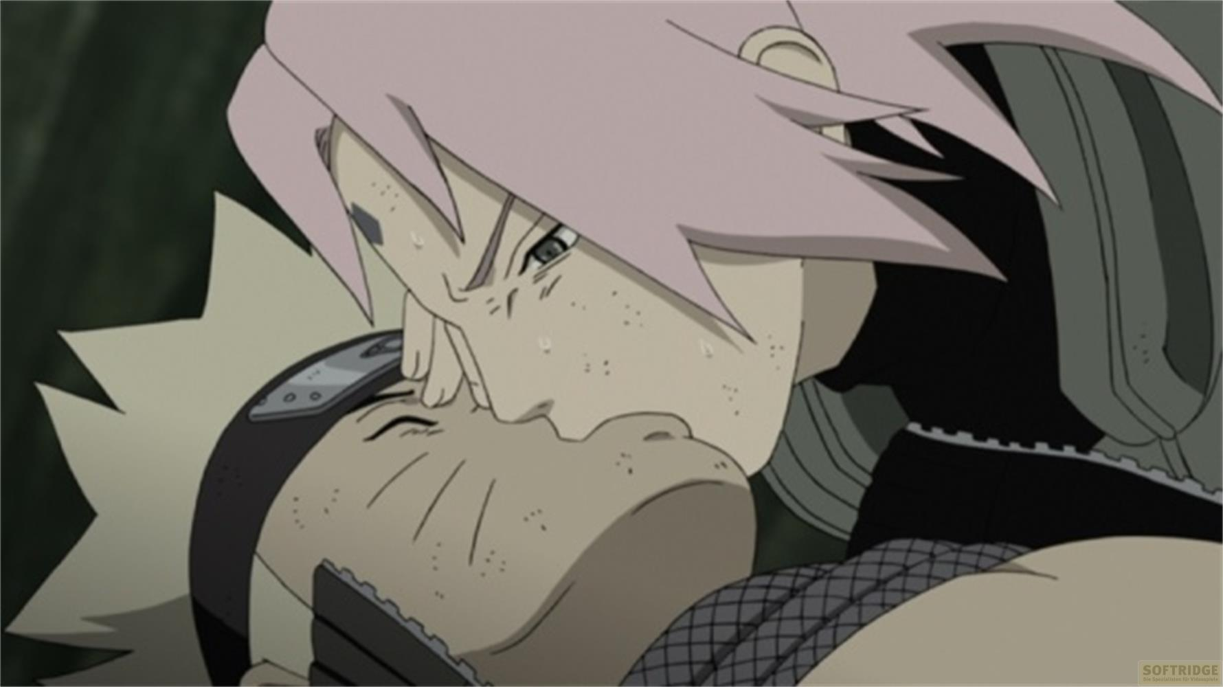 Naruto e Sakura si baciano davanti a uno sfondo scuro.