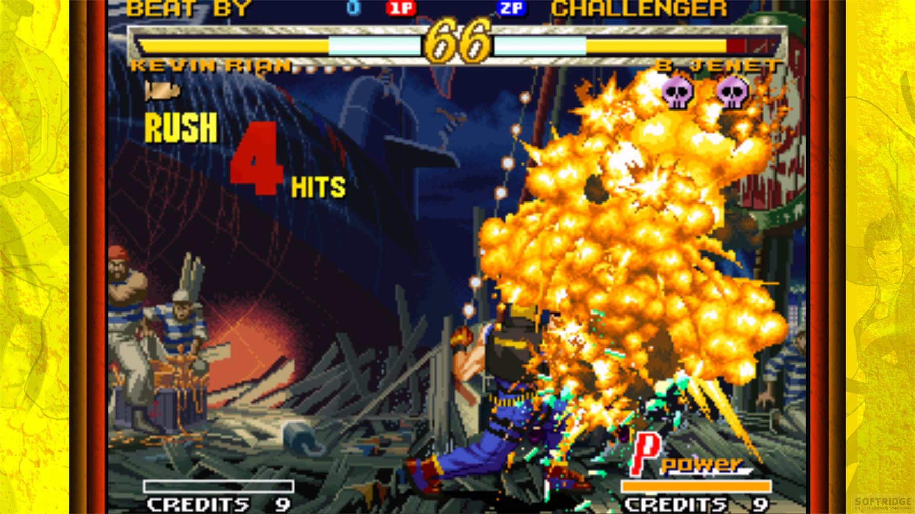 Scène de jeu de combat avec une grosse explosion orange. Personnages en tenues bleues et rayées.