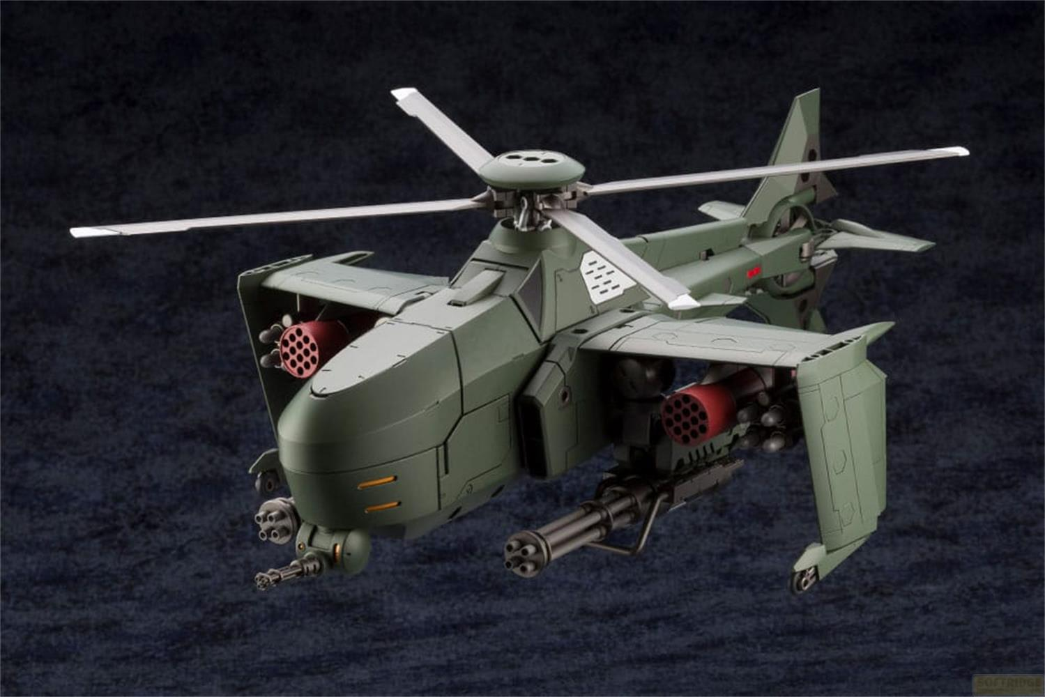 Ein militärischer Hubschrauber mit Tarnung, Raketenwerfern und einem Maschinengewehr.