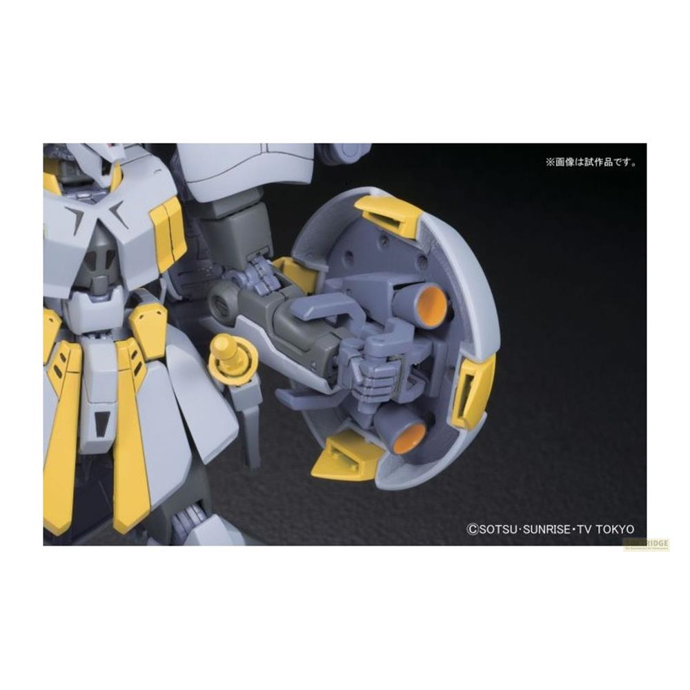 Détail de robot gris et jaune montrant buses et articulations.