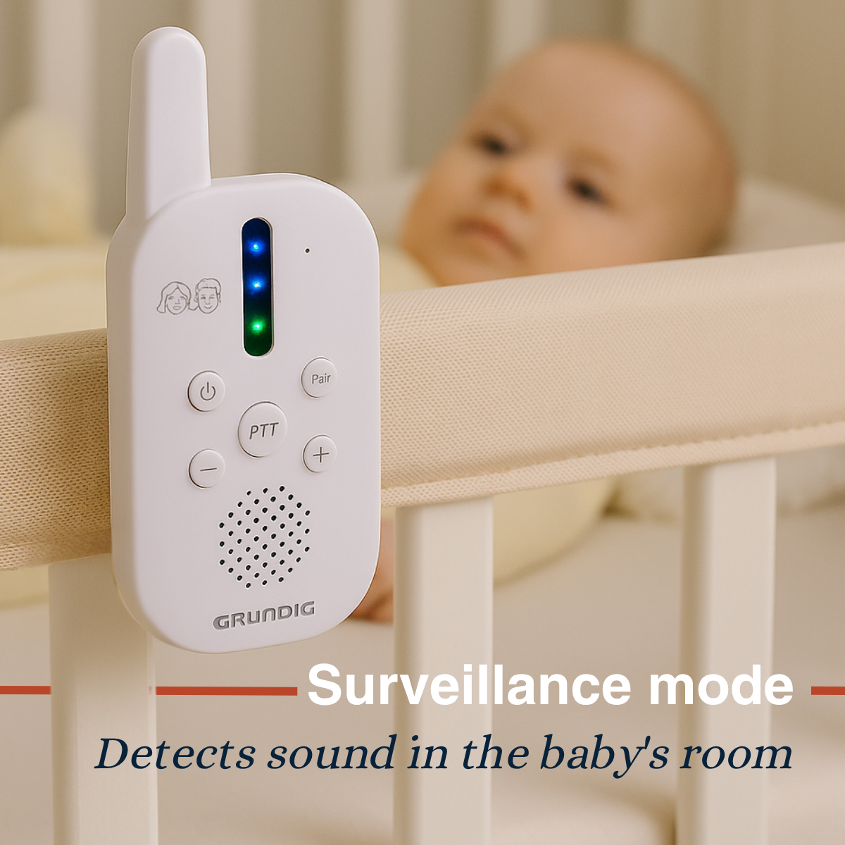 A white baby monitor with lights hangs on a crib, with a baby blurred in the background.