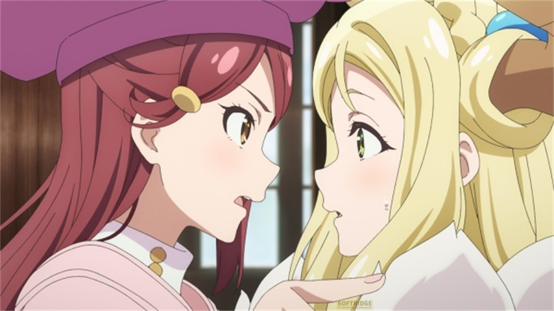 Due ragazze anime con capelli rossi e biondi si guardano.