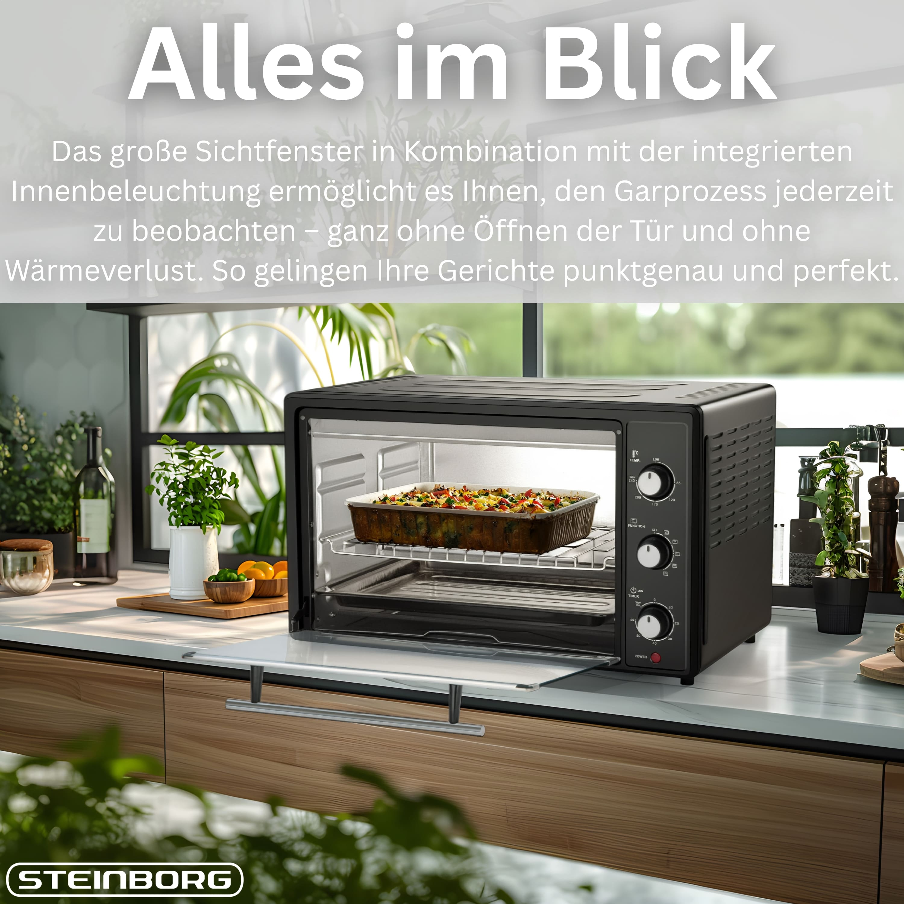 Ein schwarzer Tischbackofen mit einem Gericht darin, auf einer Küchentheke.
