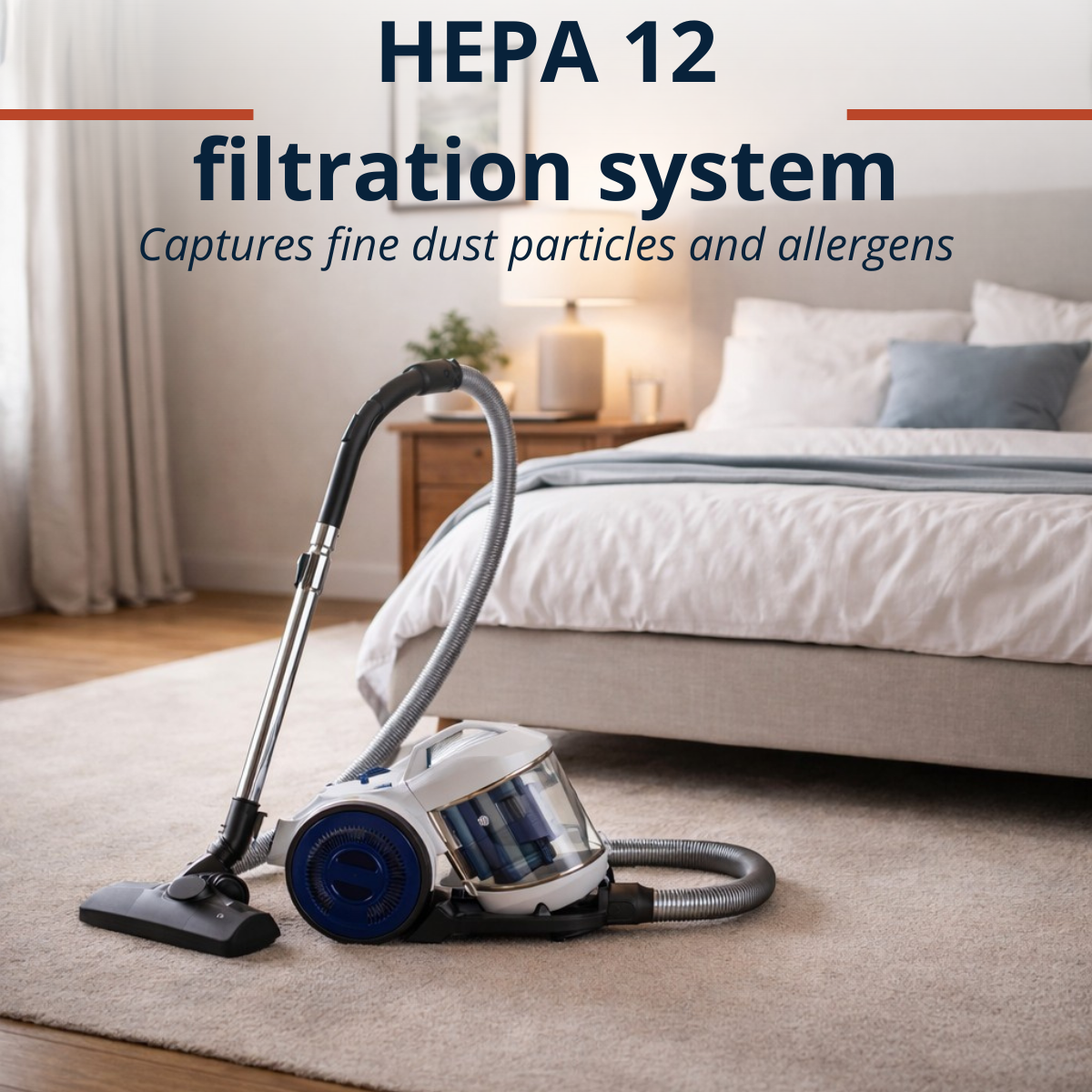 A white vacuum cleaner with blue accents sits on a carpet in front of a bed.