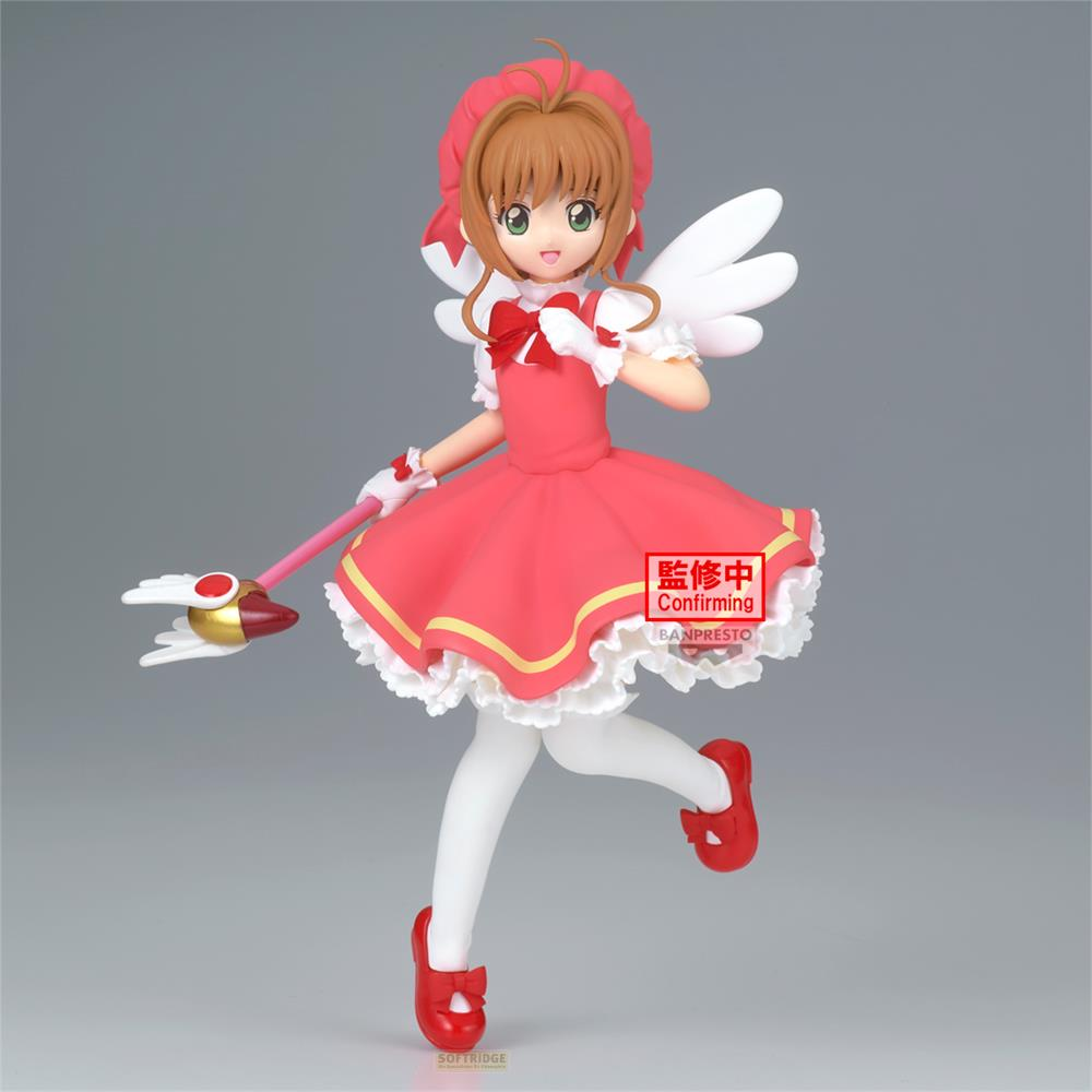 Figura de anime de una joven con vestido rojo, alas y varita.