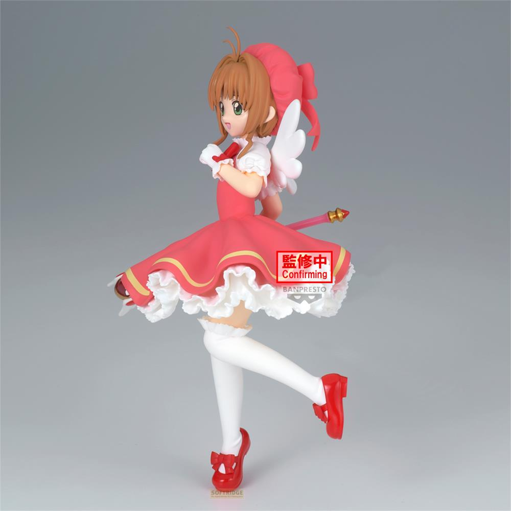 Figura de Sakura con vestido rosa, alas y varita.