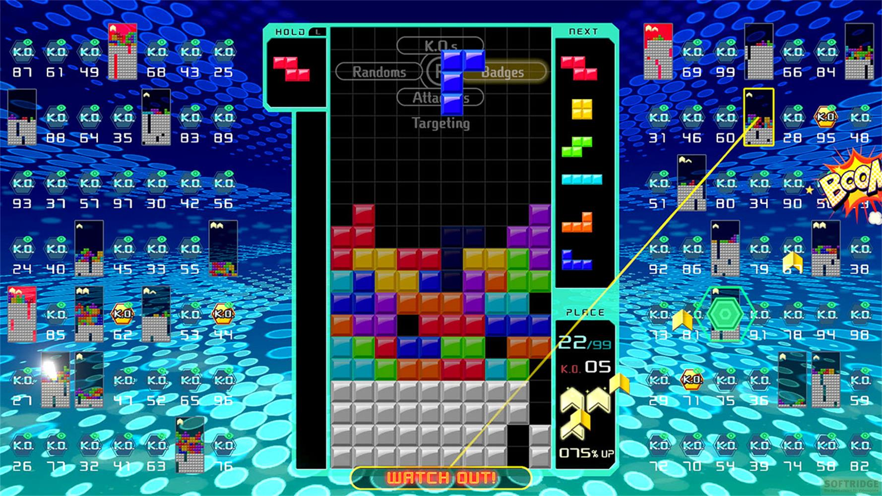 Schermata di gioco Tetris con blocchi colorati, conteggi K.O. e punteggi.