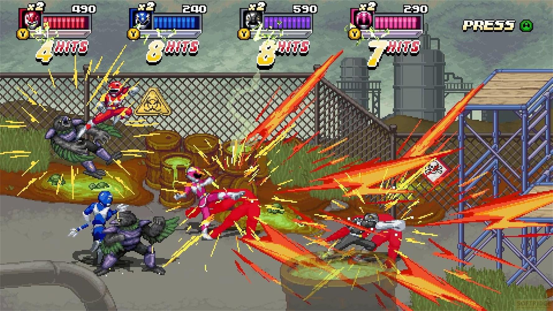 Power Rangers kämpfen gegen Monster in einer industriellen Umgebung.