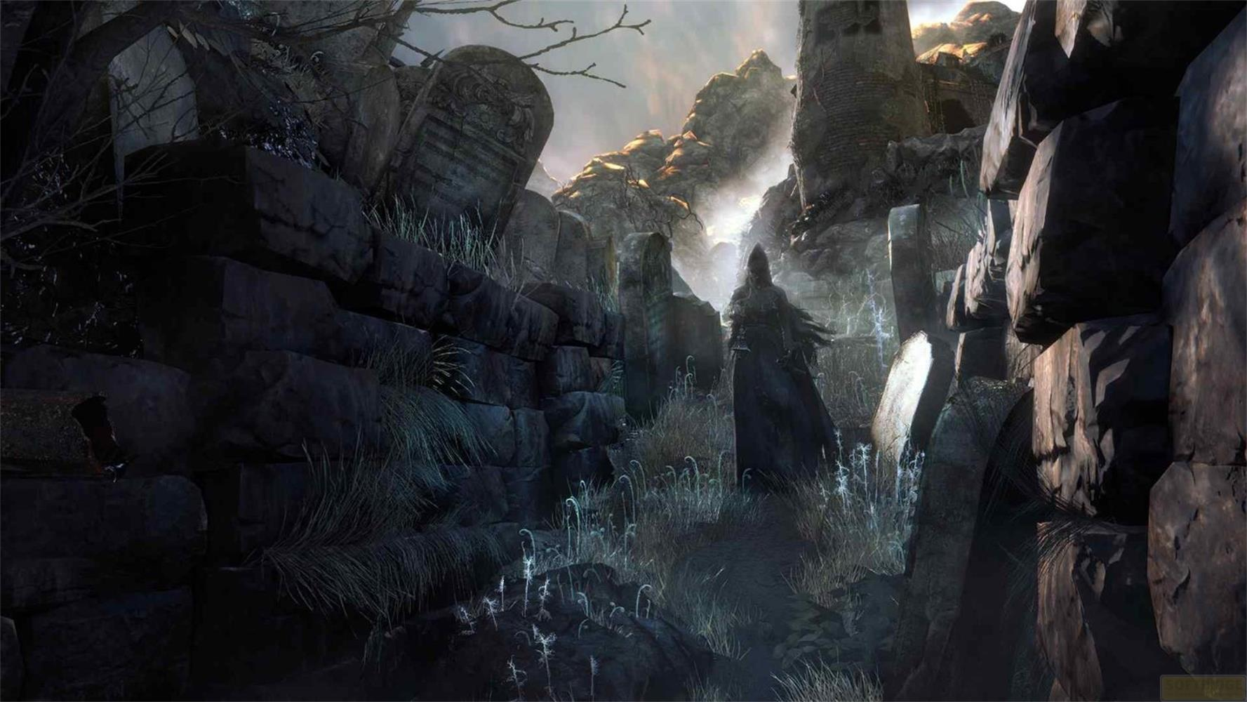 Une silhouette sombre se tient dans un cimetière avec des rochers et des ruines.