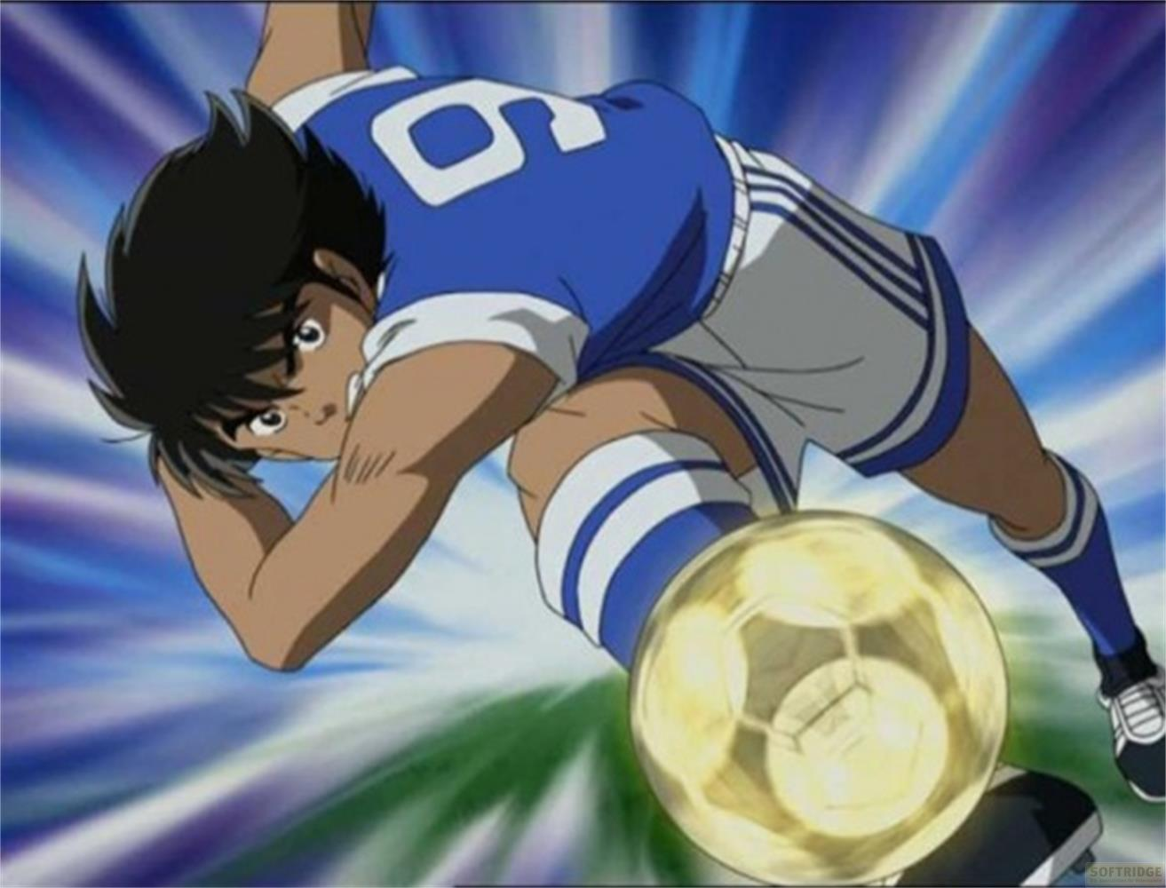 Un calciatore in maglia blu numero 9 calcia un pallone.