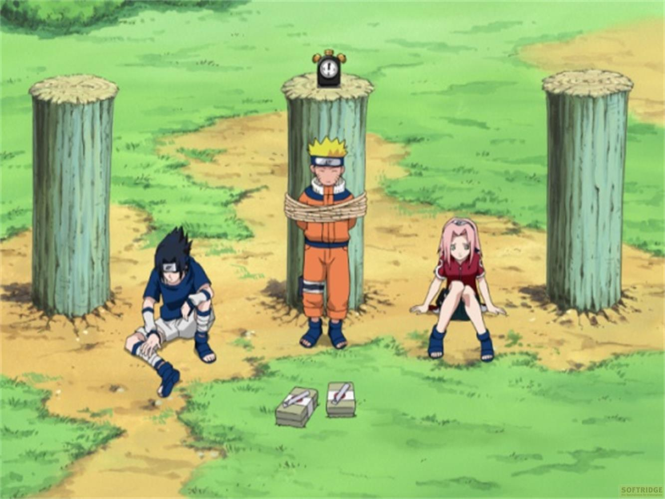Naruto è legato, con Sasuke e Sakura seduti davanti. Una sveglia è in cima al palo.