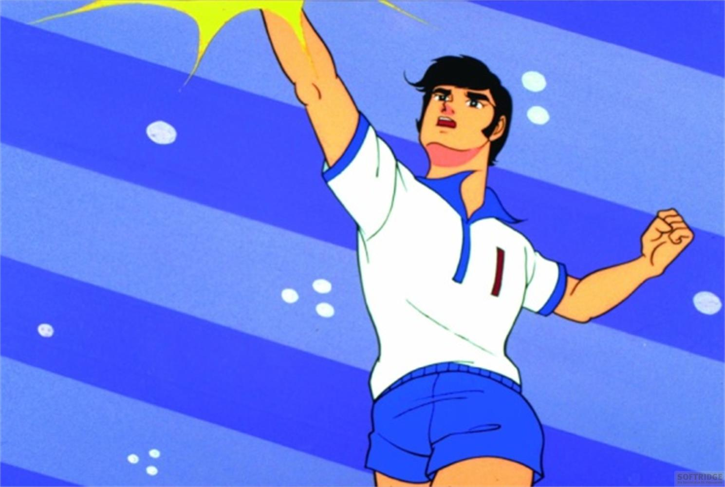 Ein Mann in einem weißen Trikot mit blauen Akzenten und blauen Shorts hebt den Arm.