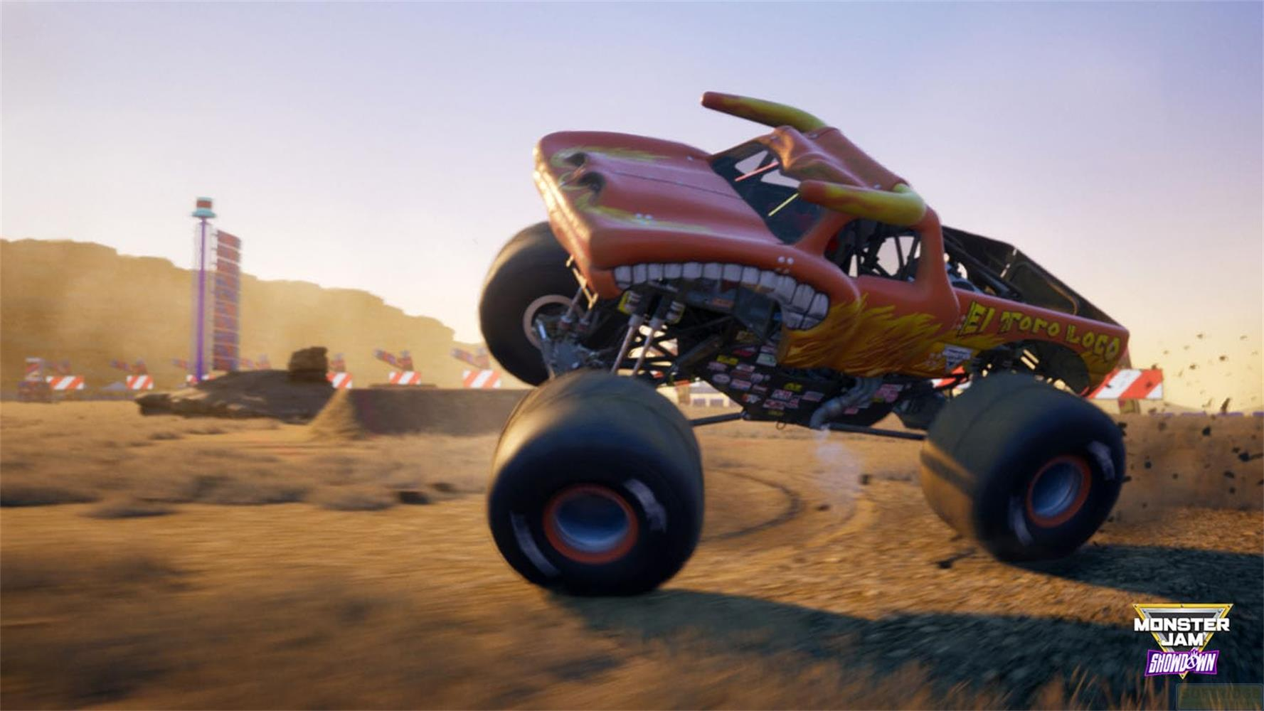 Orange Monster Truck "El Toro Loco" springt in der Wüstenszene mit großen Rädern.
