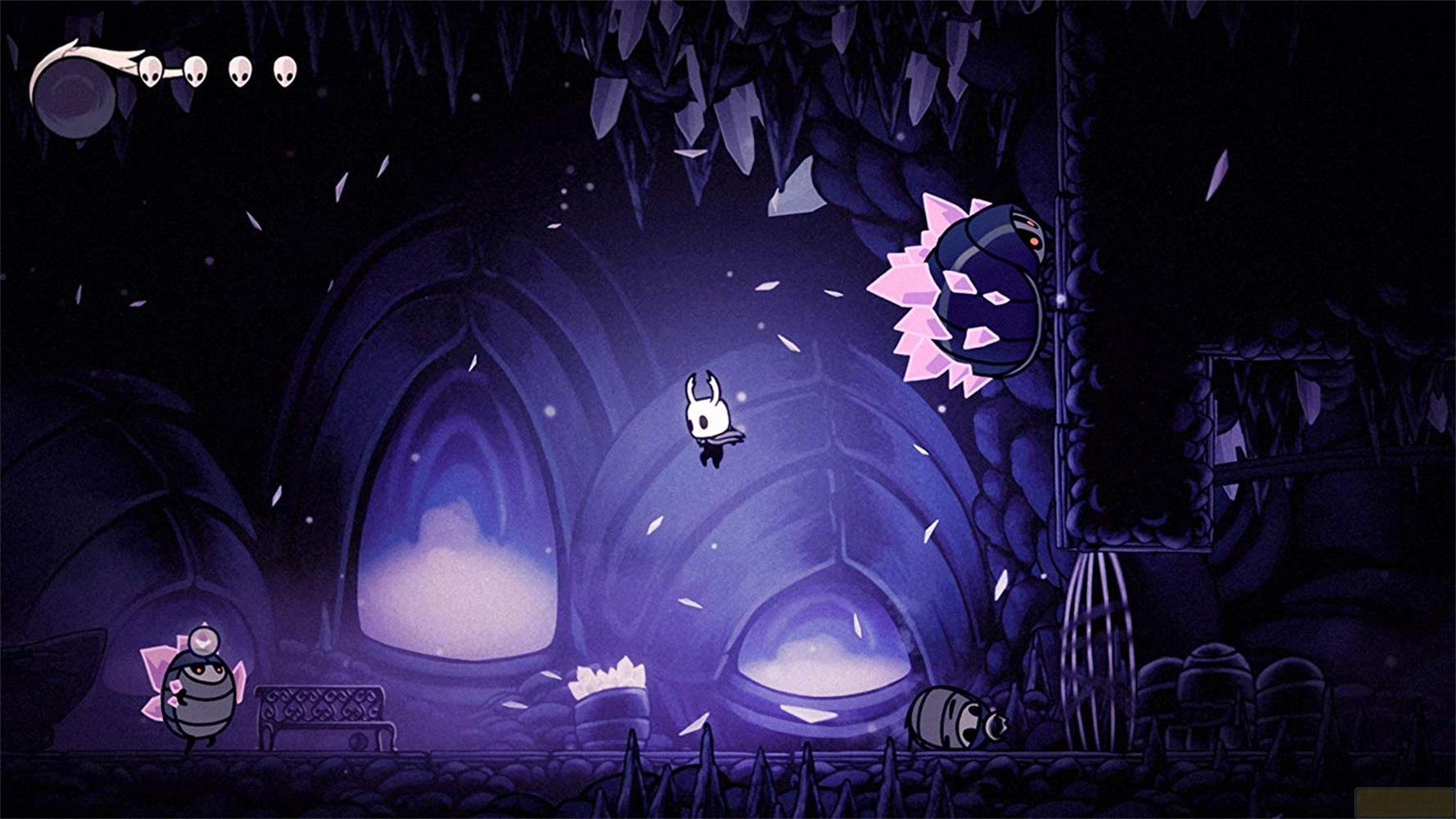 Un petit personnage blanc saute dans une grotte sombre avec des cristaux violets.
