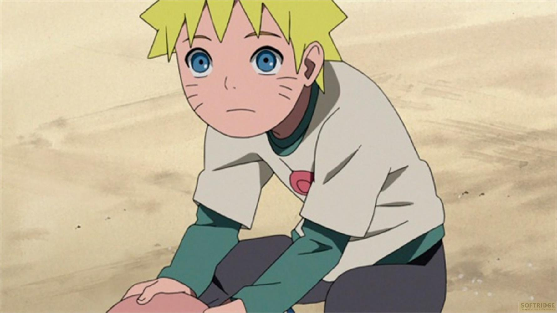Un ragazzo anime con capelli biondi e occhi blu si inginocchia su un terreno sabbioso.