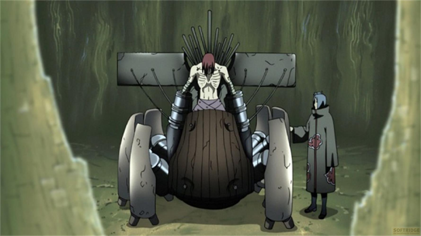 Un homme sur une machine ressemblant à une araignée avec un autre homme à côté.