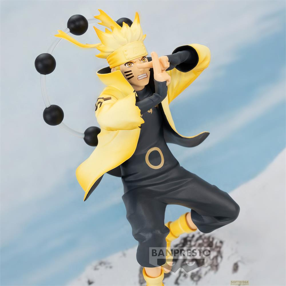 Figura de Naruto con chaqueta amarilla y orbes negros, montañas nevadas.