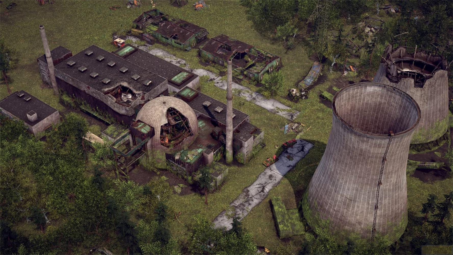 Verlassene Industrieanlage mit zerstörten Gebäuden und Kühltürmen im Wald.
