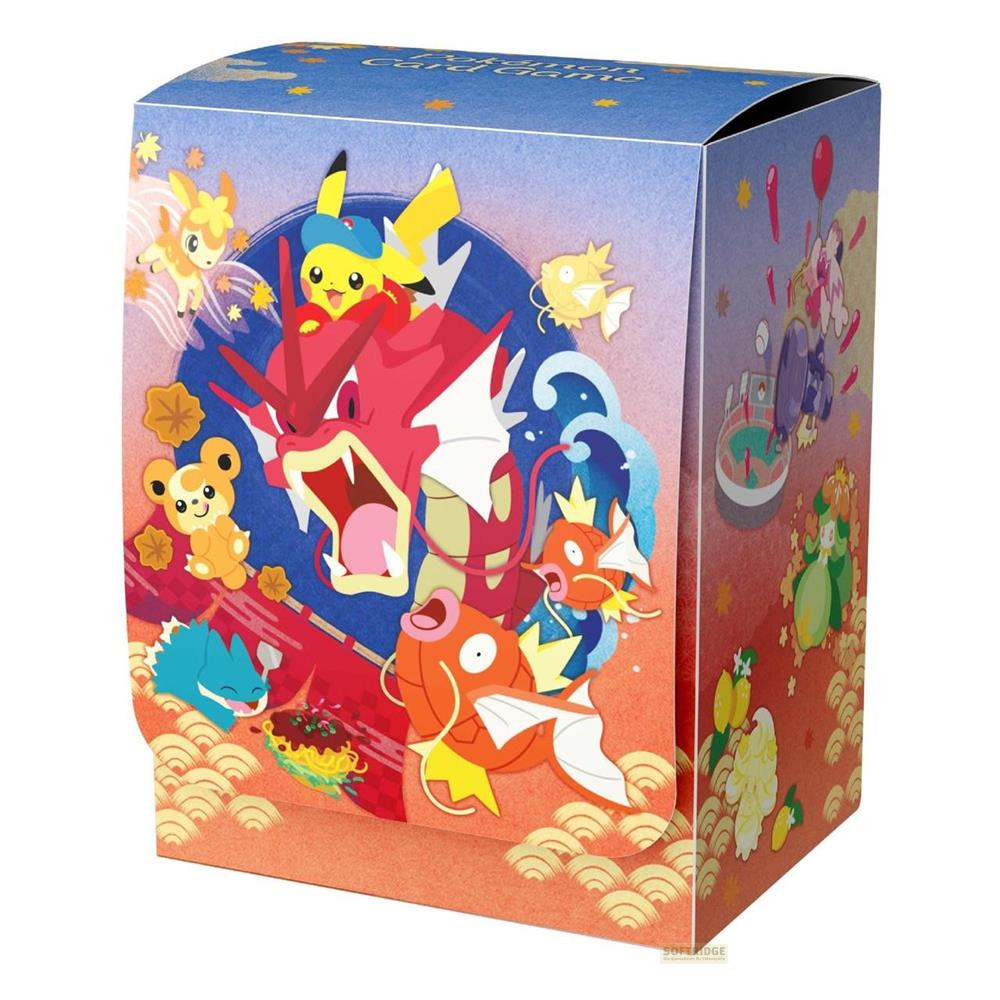 Boîte de cartes Pokémon avec Gyarados, Pikachu et d'autres personnages art coloré.