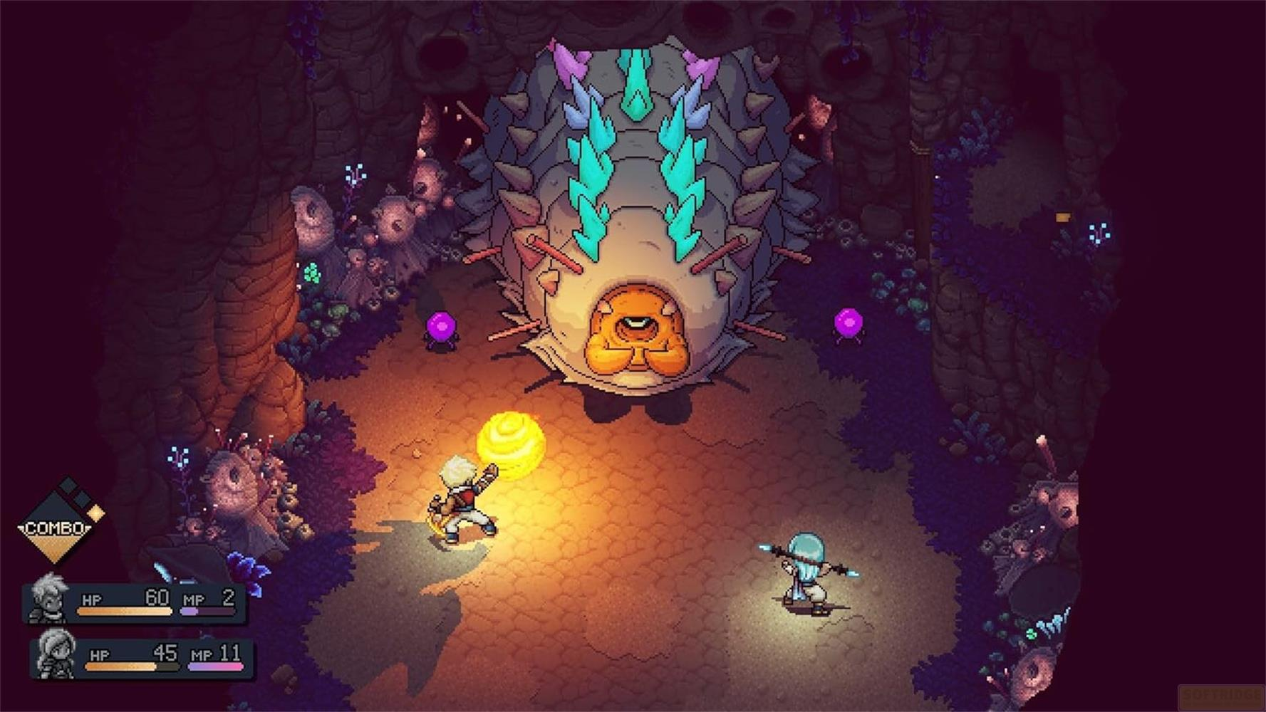 Deux personnages combattent un gros boss scarabée dans une grotte.