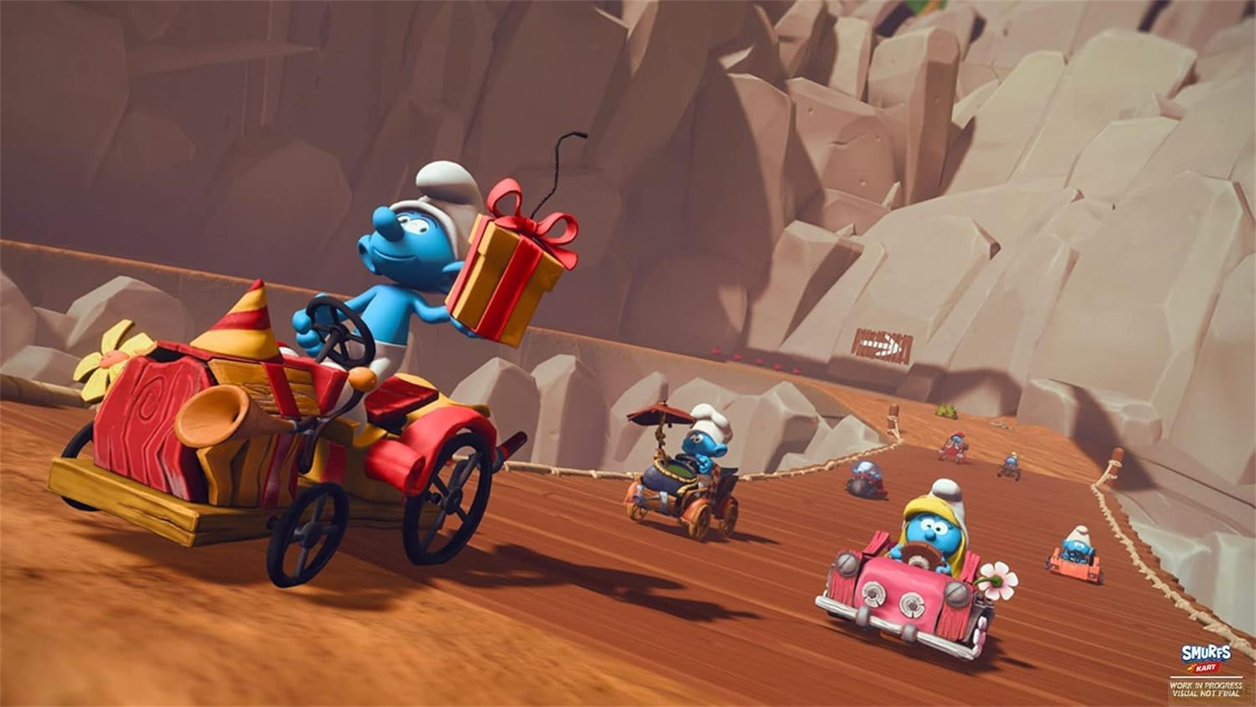 Blaue Schlümpfe rasen in bunten Karts einen Holzhügel hinunter.