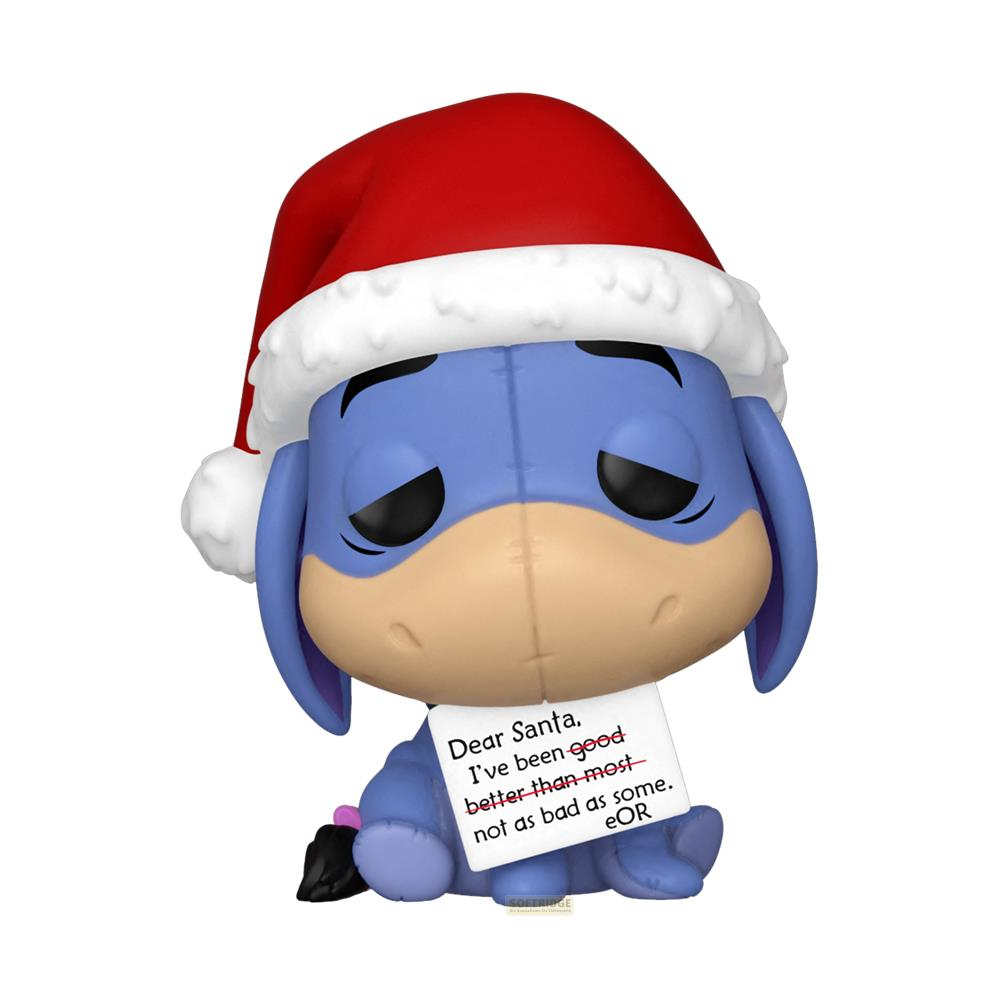 Ih-Oh con cappello di Babbo Natale tiene un cartello: 'Caro Babbo Natale, sono stato meglio della maggior parte.'