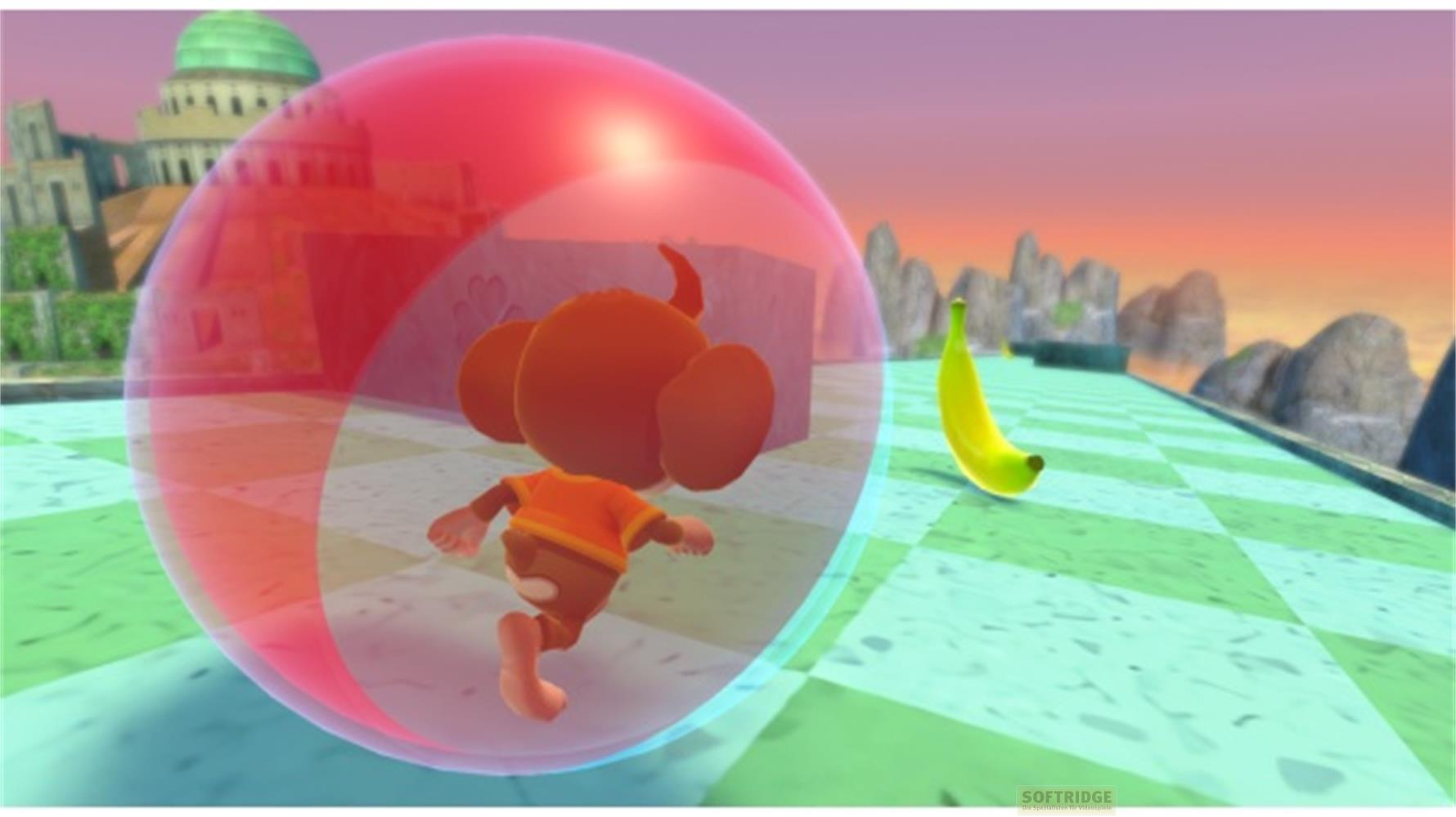 Un singe dans une bulle rouge court vers une banane.