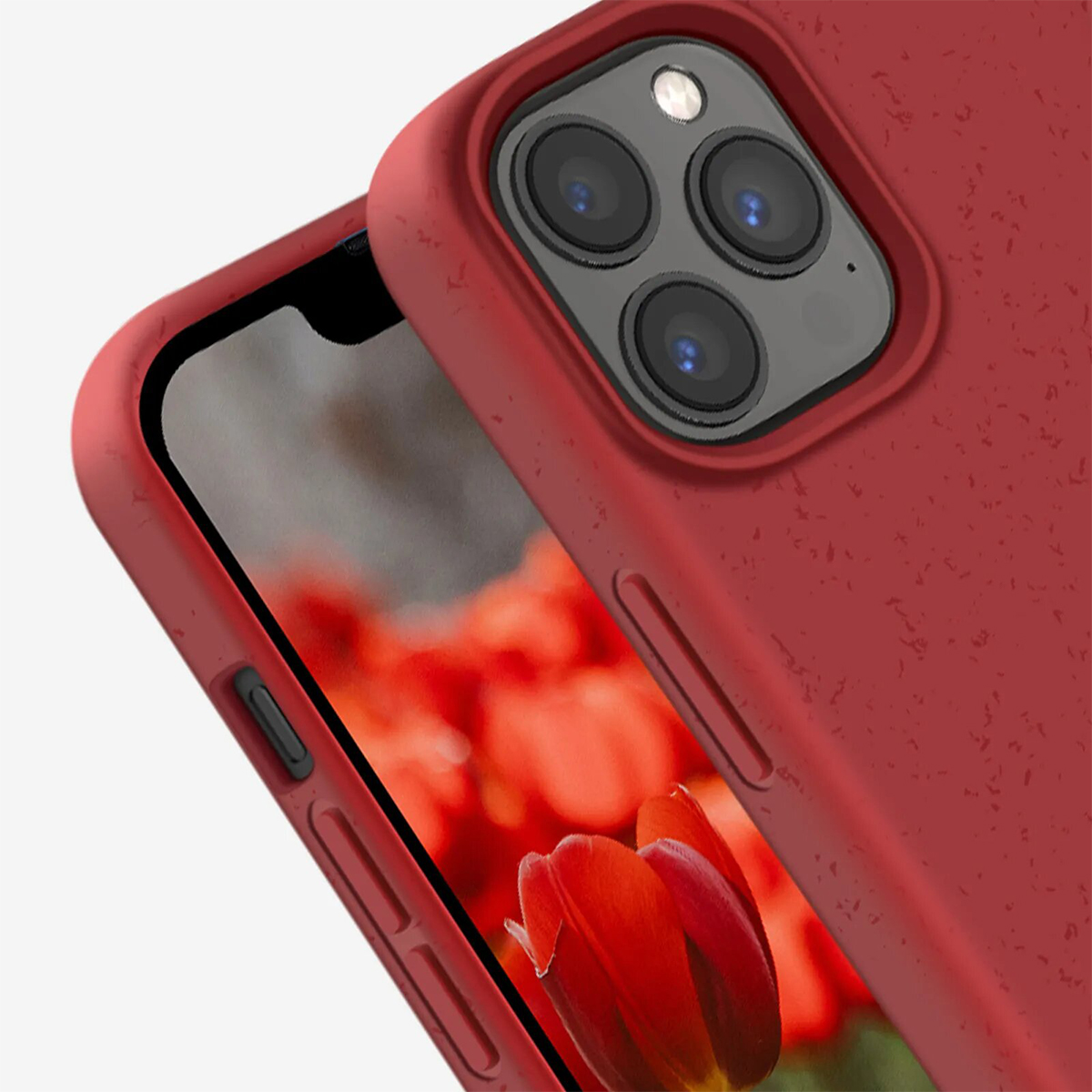 Telefono rosso con fotocamera e fiori sullo schermo.