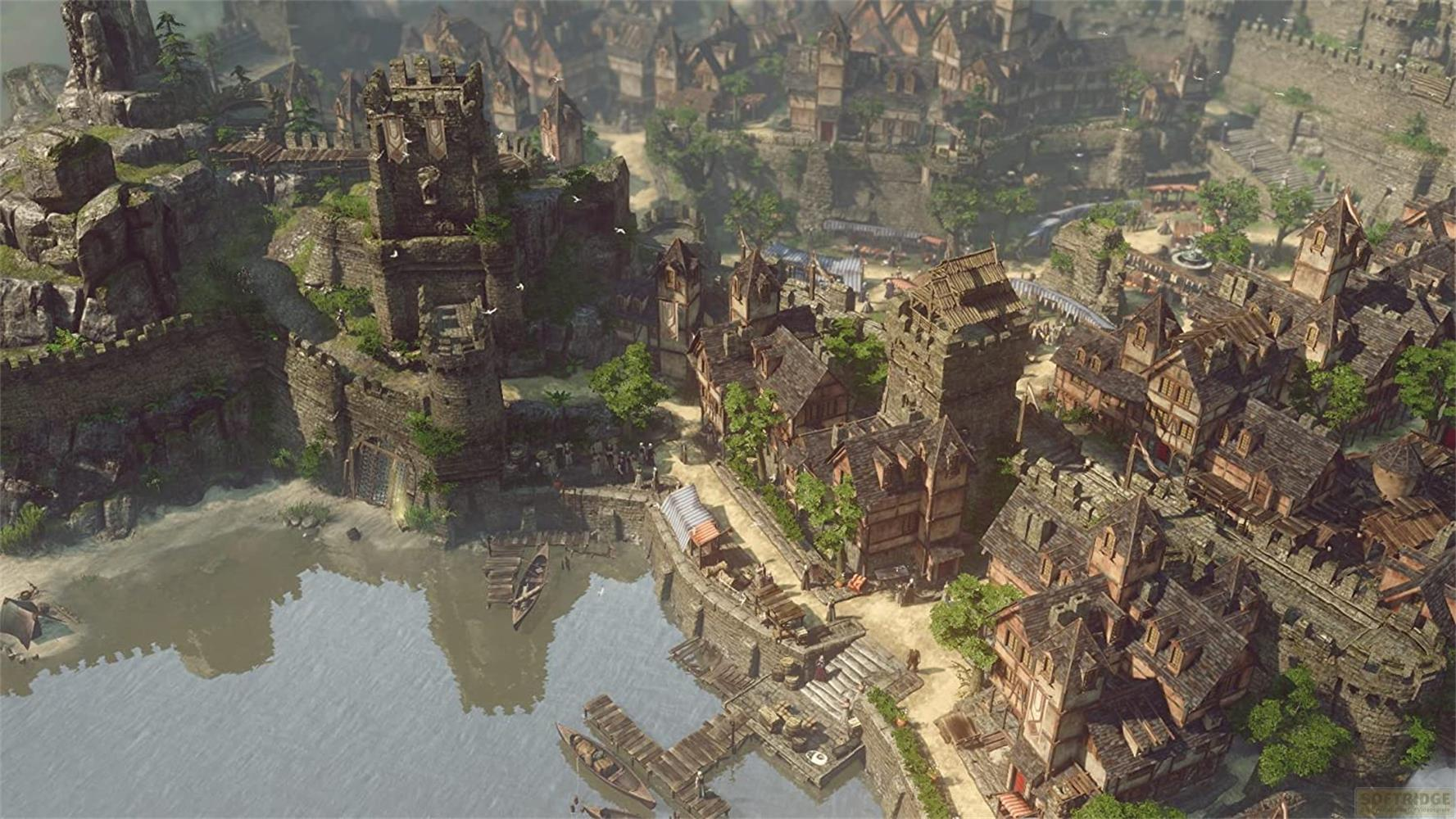 Una città medievale sul lungomare con castello e molti edifici.
