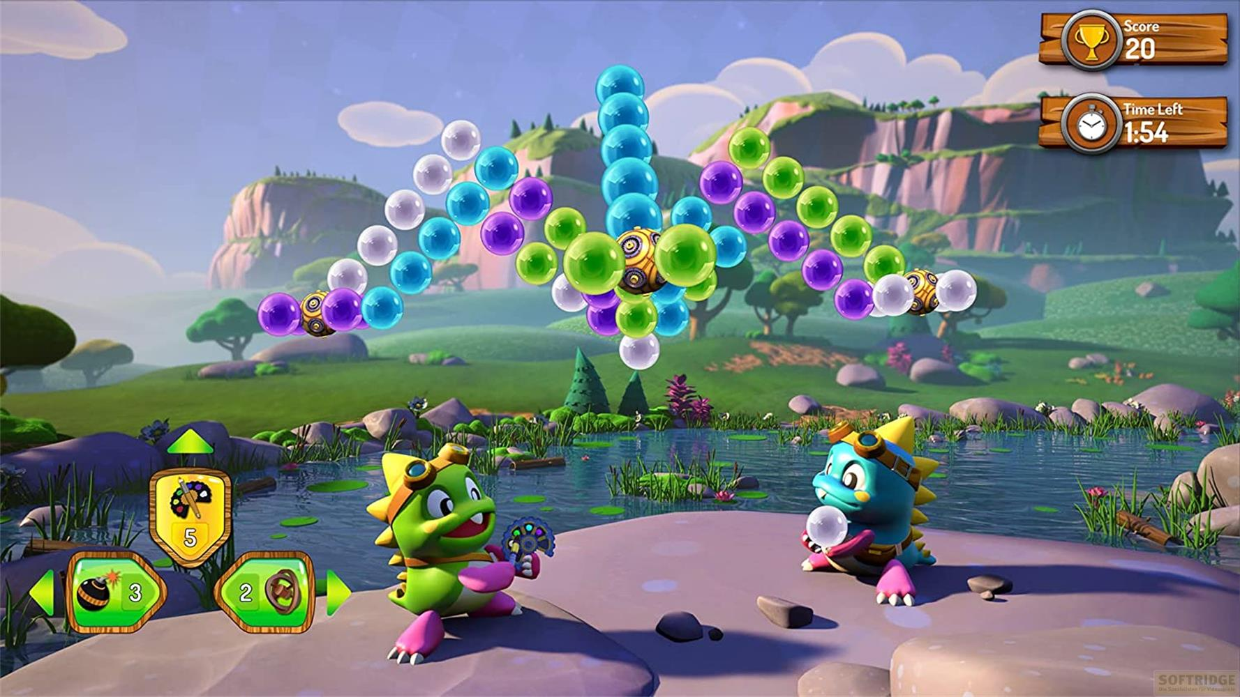Due dinosauri cartoni animati, uno verde, uno blu, siedono vicino all'acqua giocando.