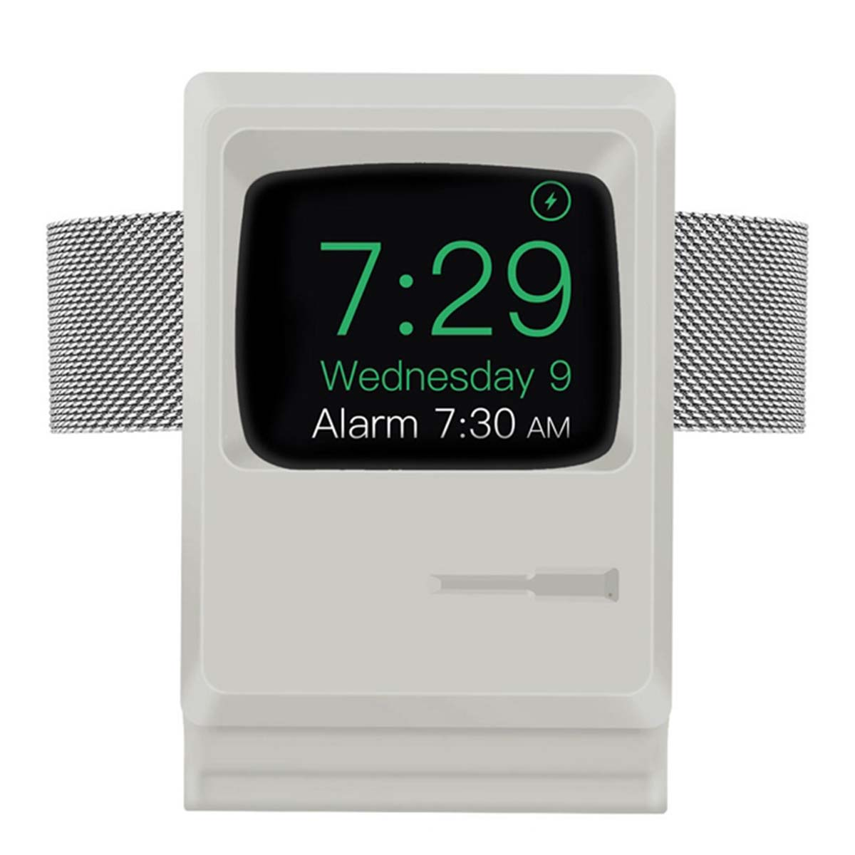 Une Apple Watch blanche dans un boîtier gris avec bracelet argenté affiche 7h29.