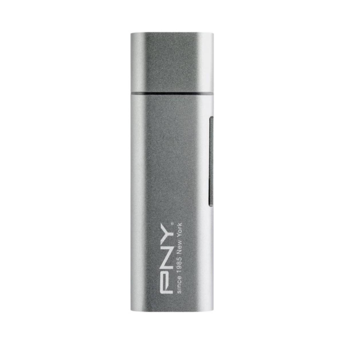 Unidad USB PNY plateada con texto 'since 1985 New York'.